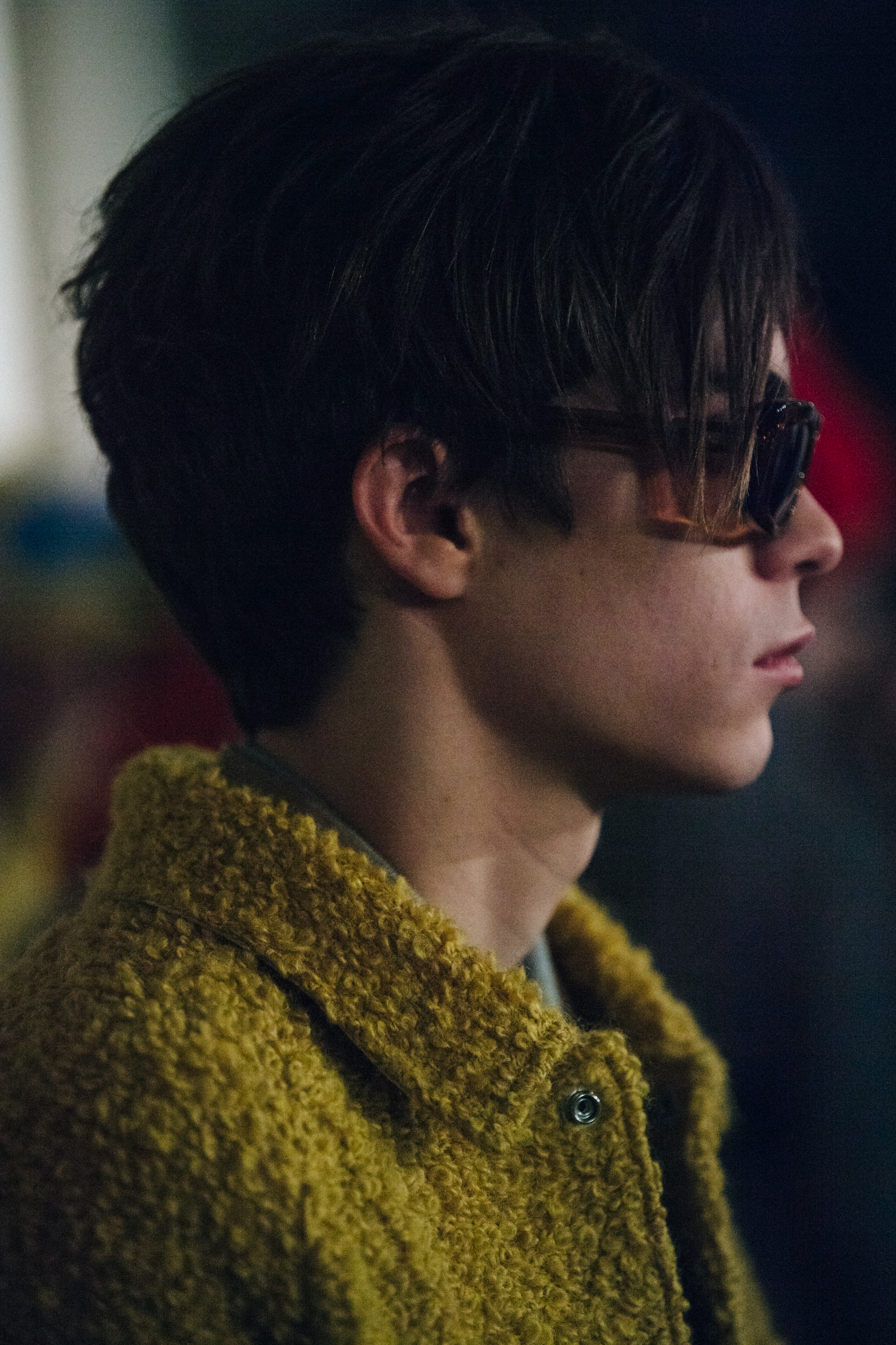 Model wearing yellow jacket