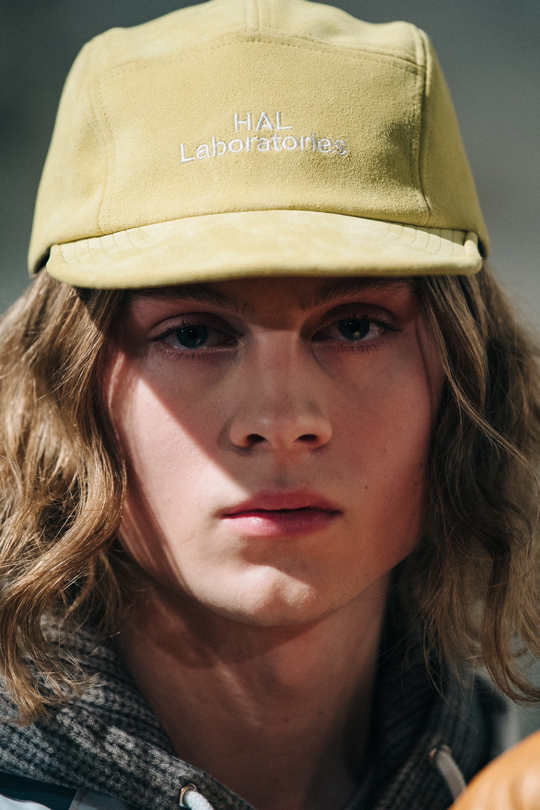 Portrait of model wearing yellow cap