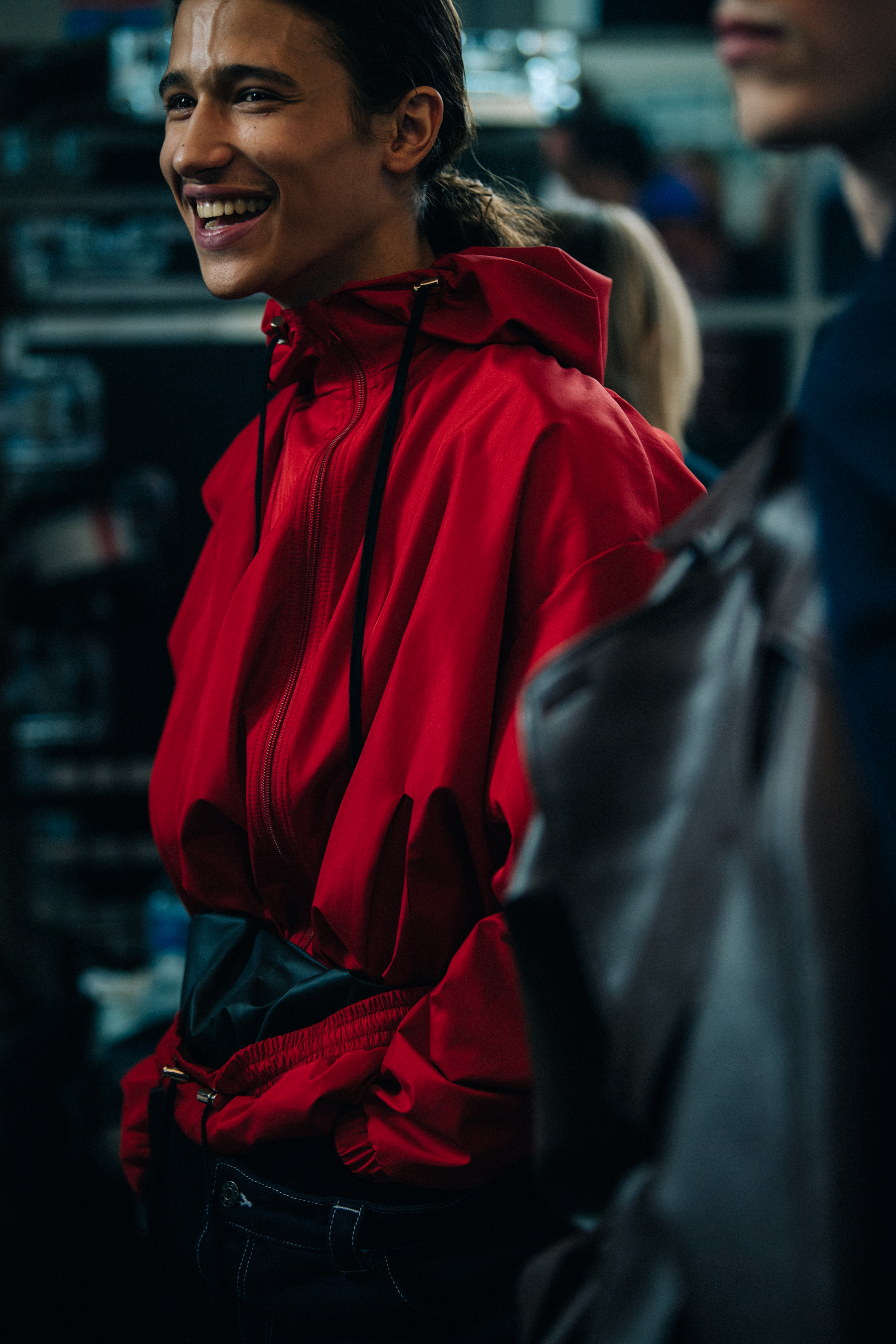 Model wearing red jacket