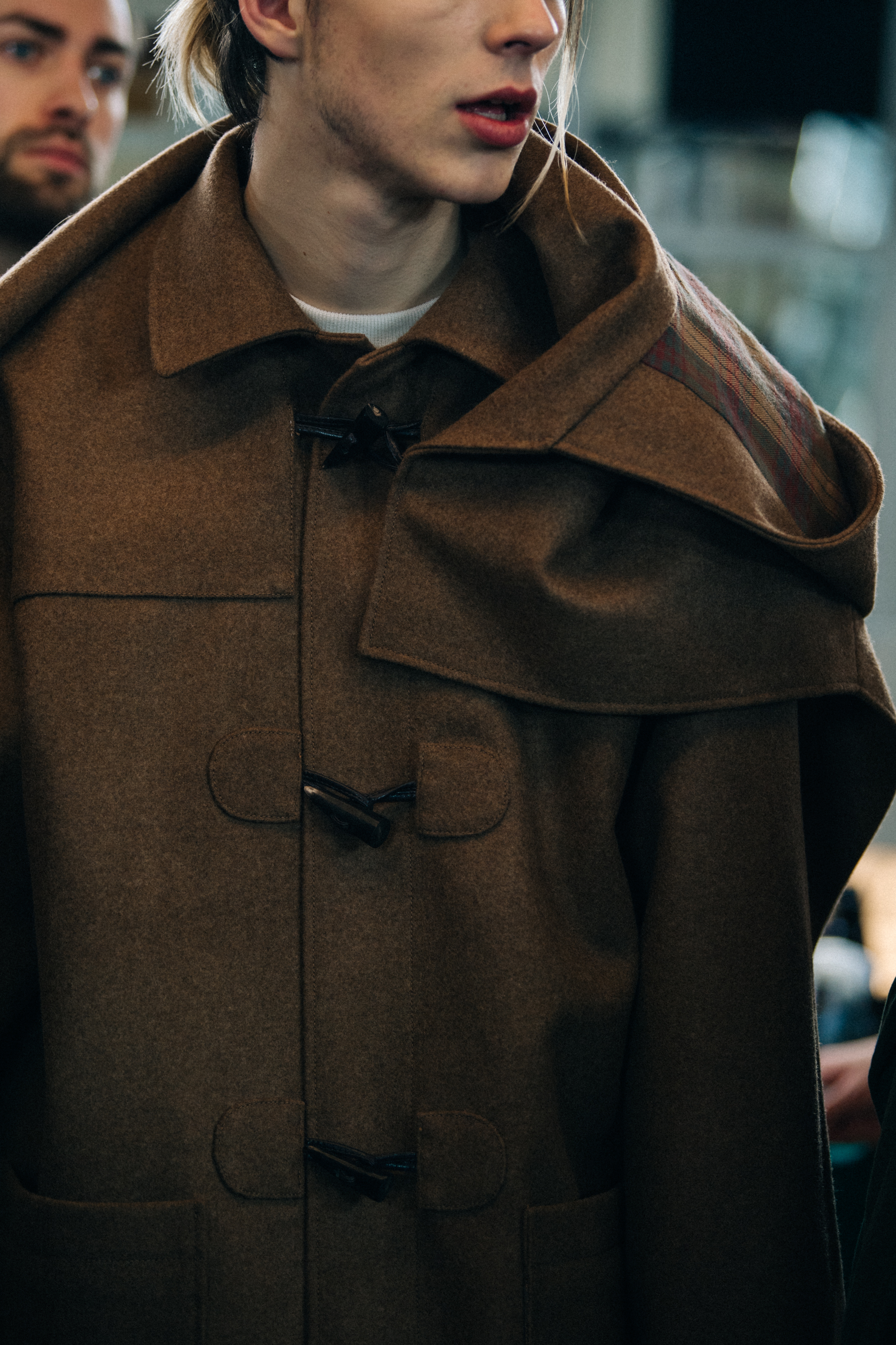 Model wearing brown winter coat