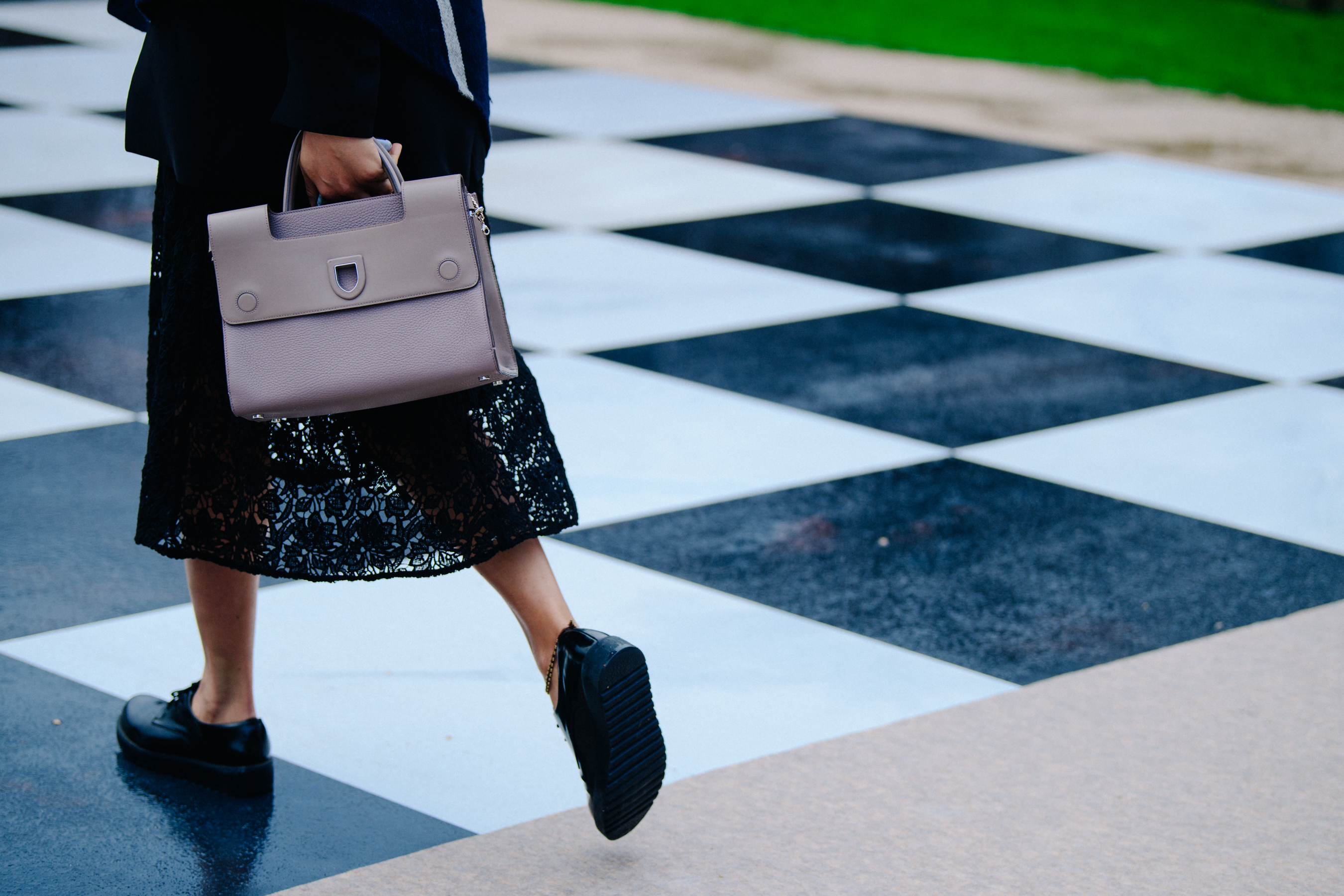 Woman wearing black smart shoes