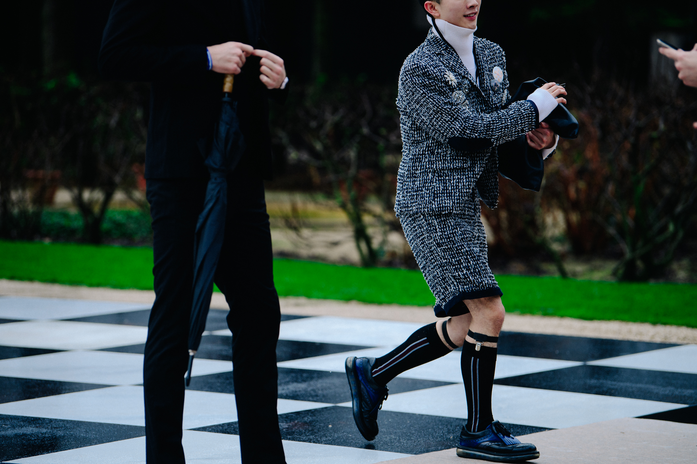 Asian man wearing Christian Dior outfit