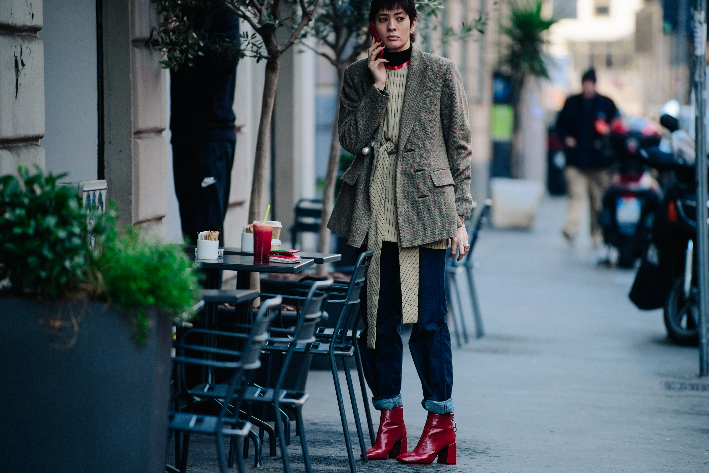 Woman wearing red leather boots