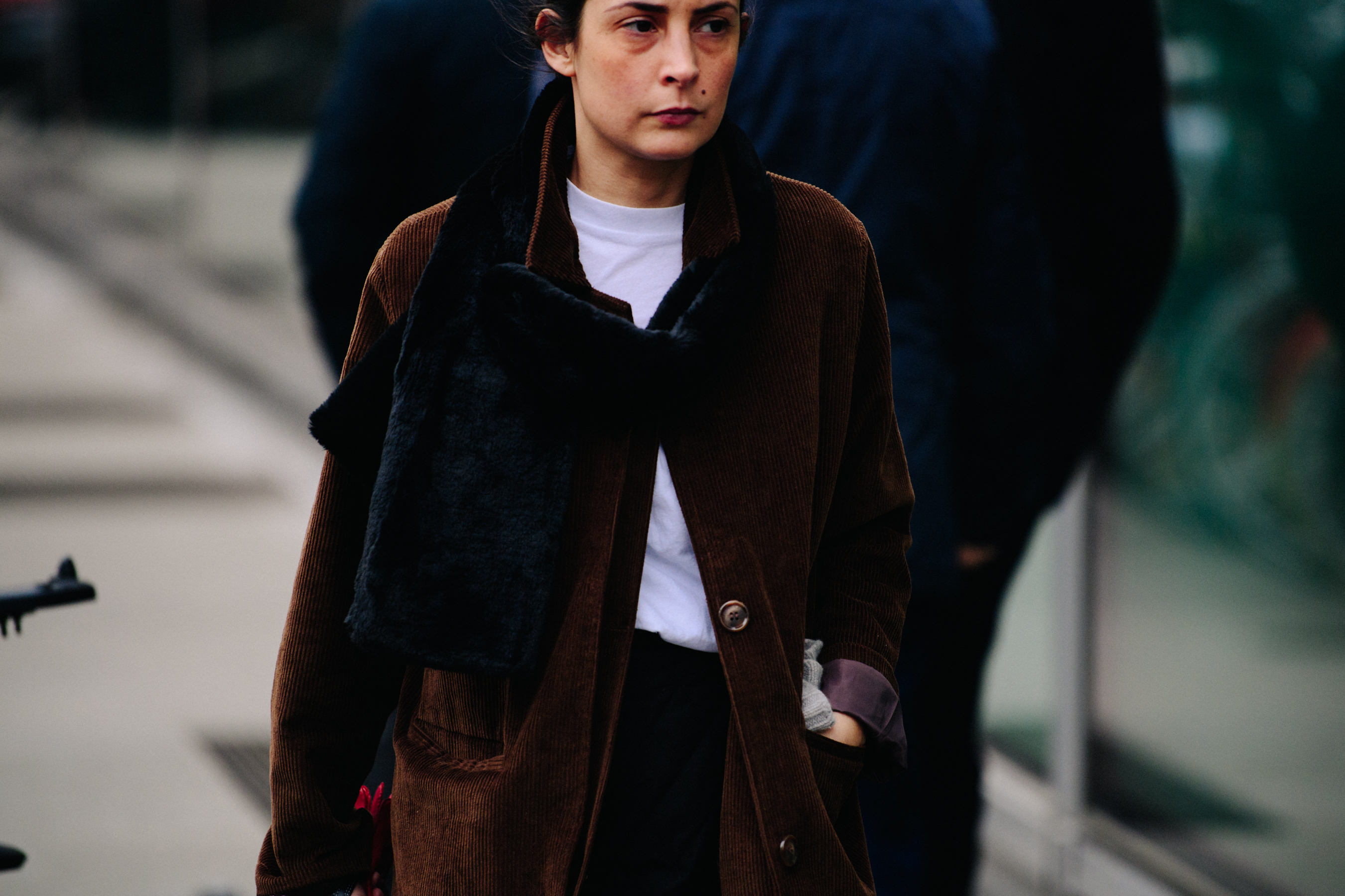 Girl wearing brown corduroy coat