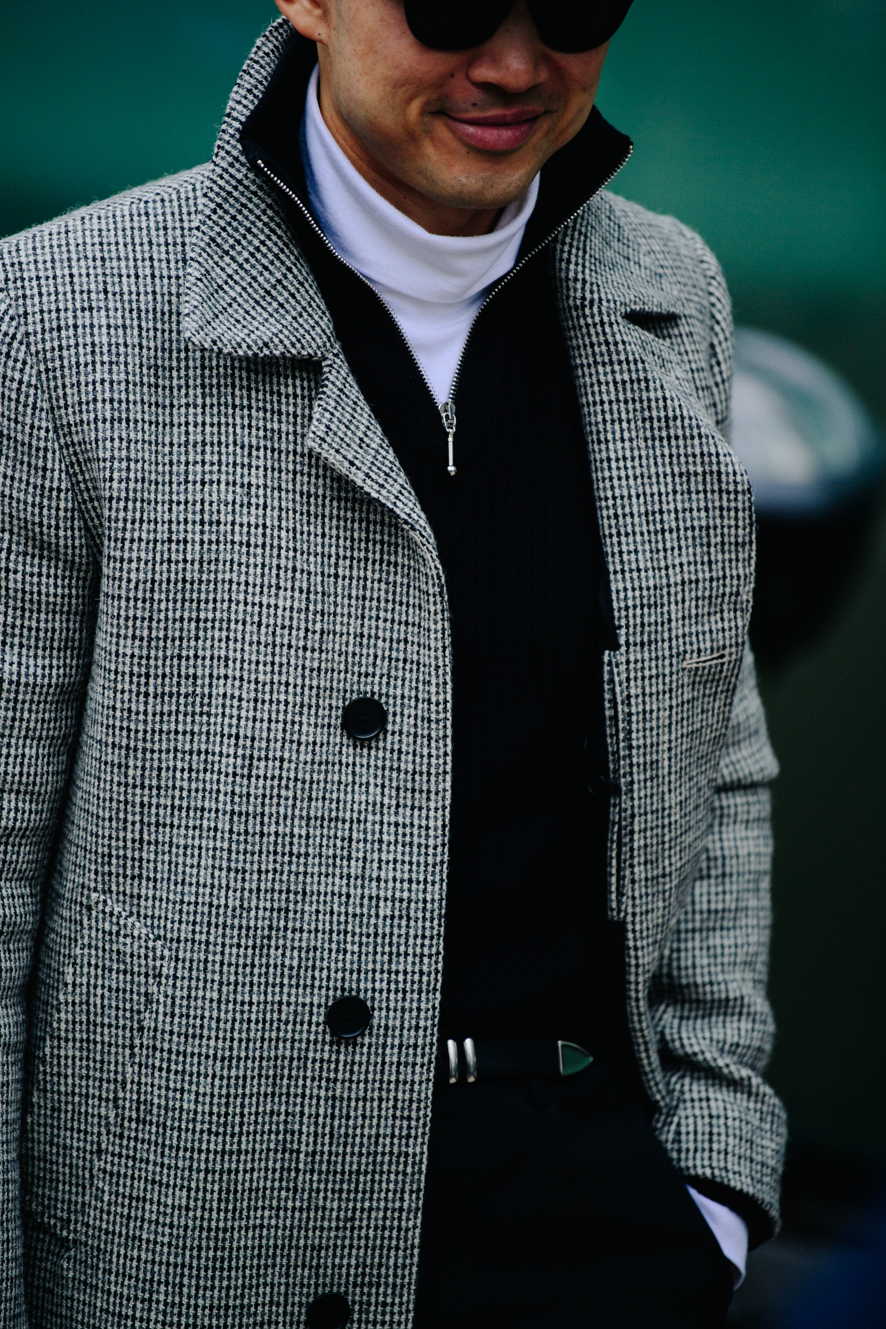 Asian man wearing white wool coat