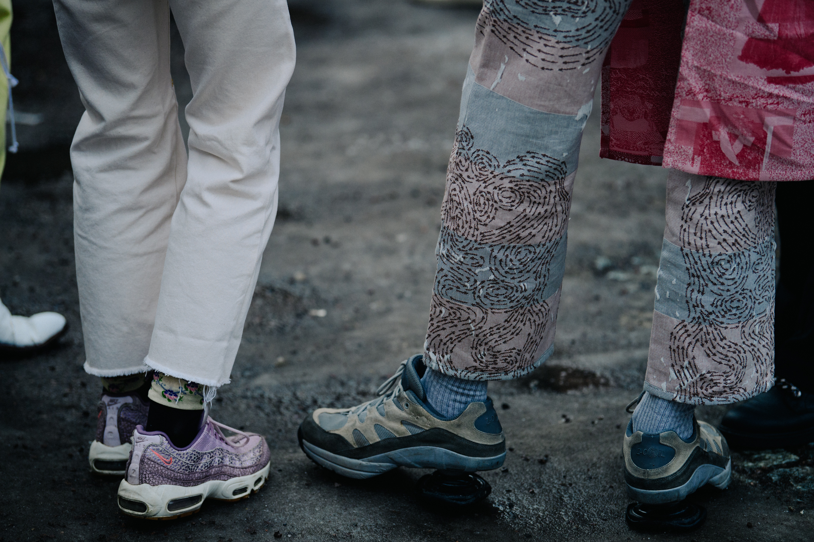 Two girls wearing sporty sneakers