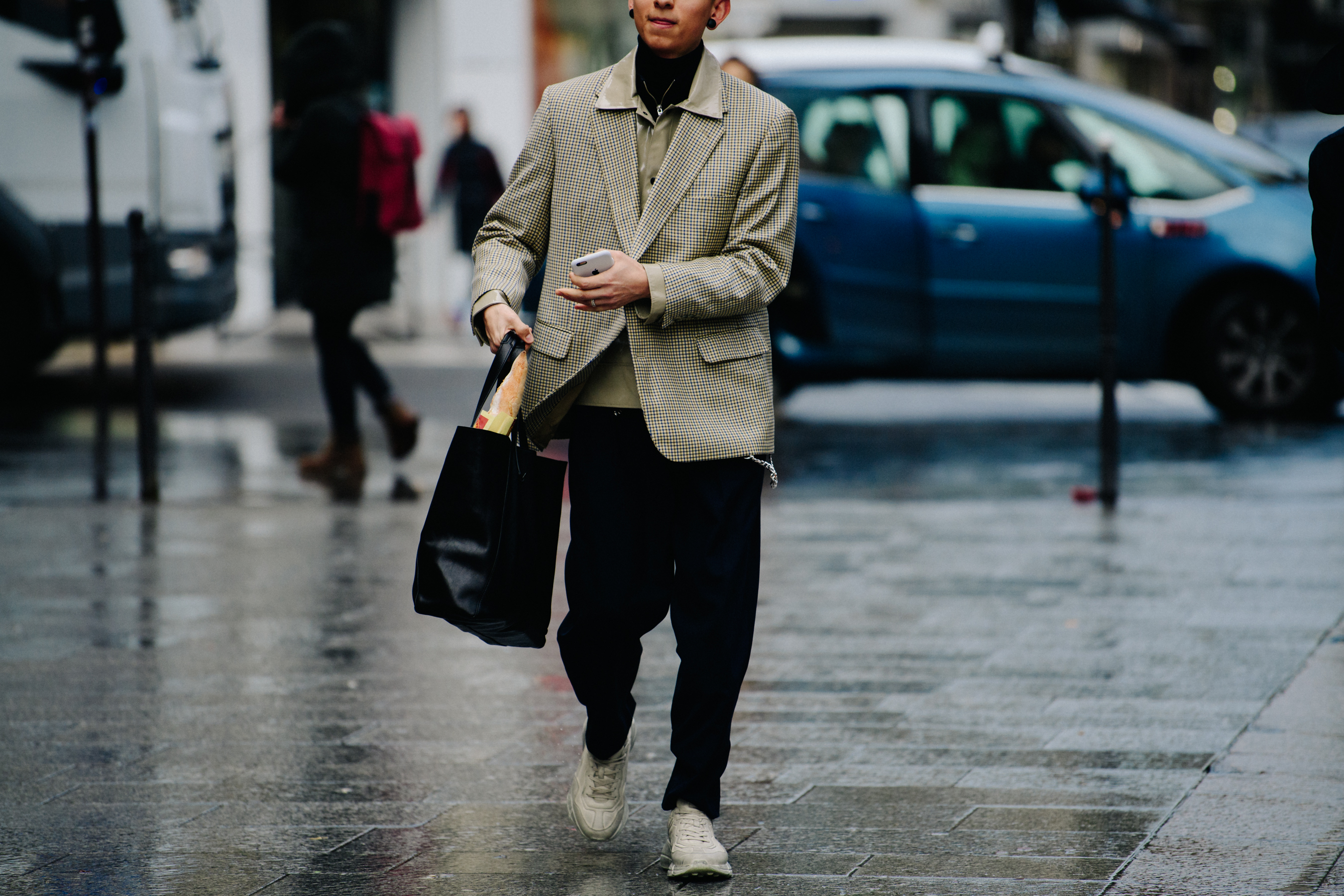 Man wearing pale green suit