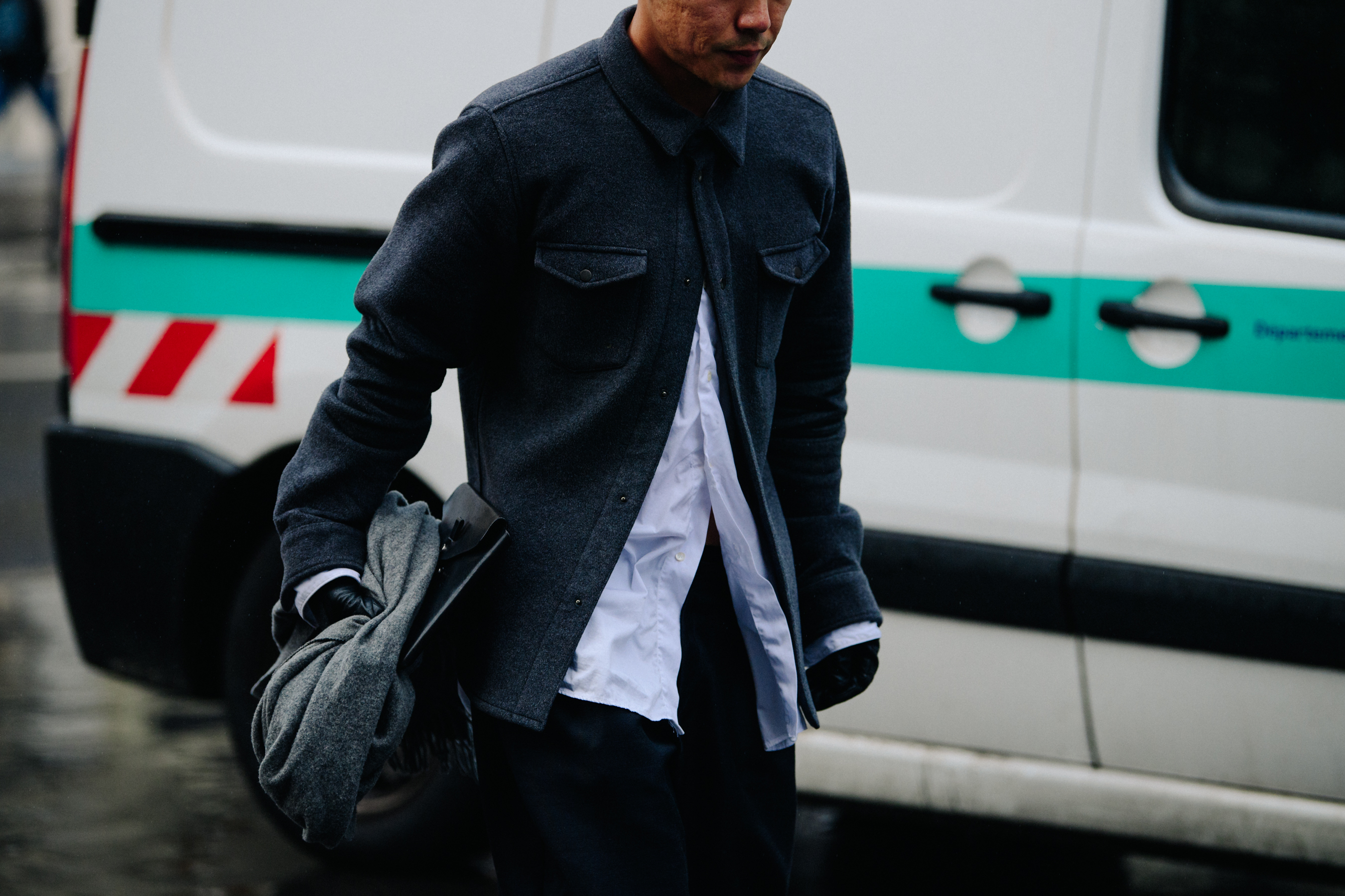 Asian man wearing grey wool shirt