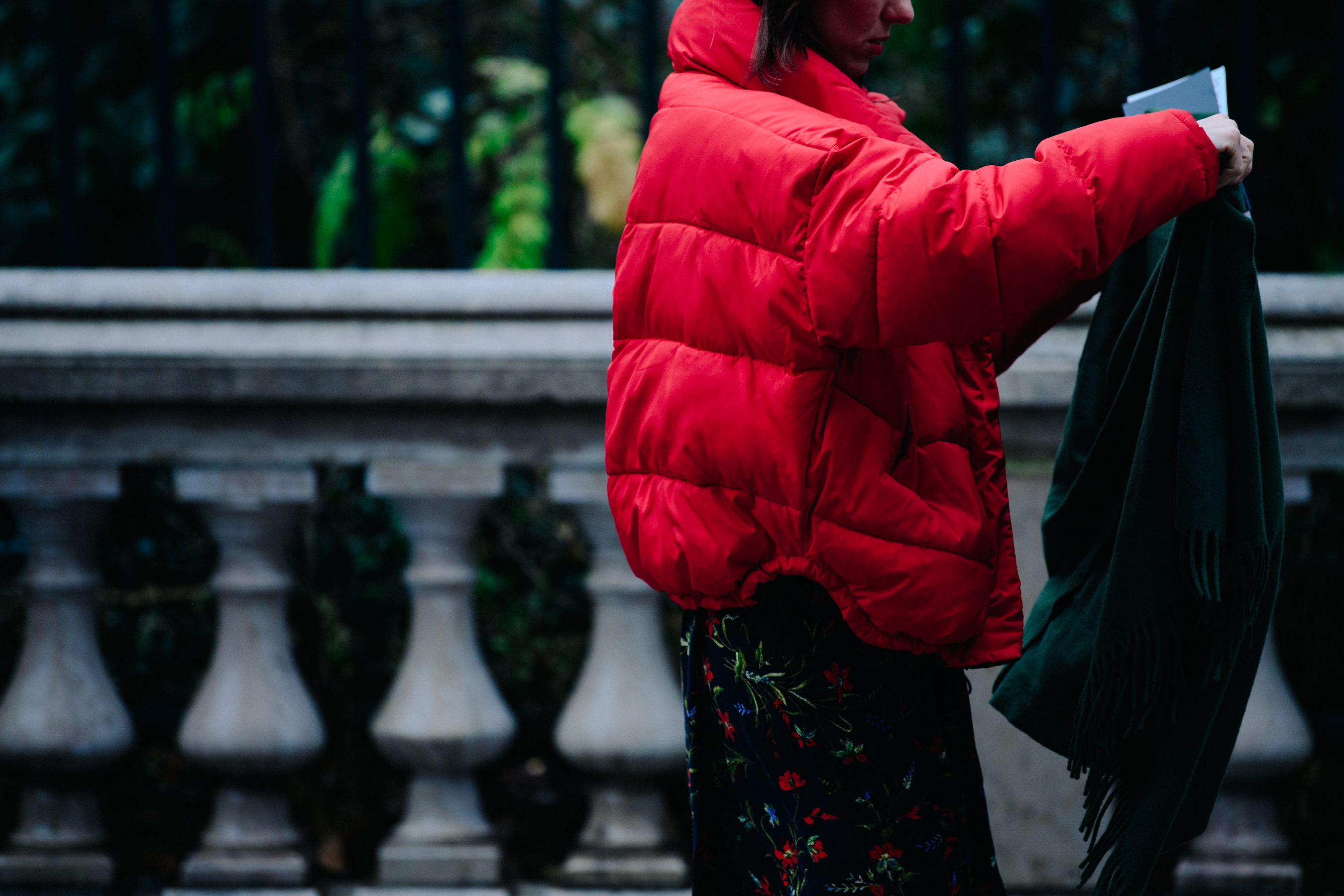 Woman wearing red puffer coat