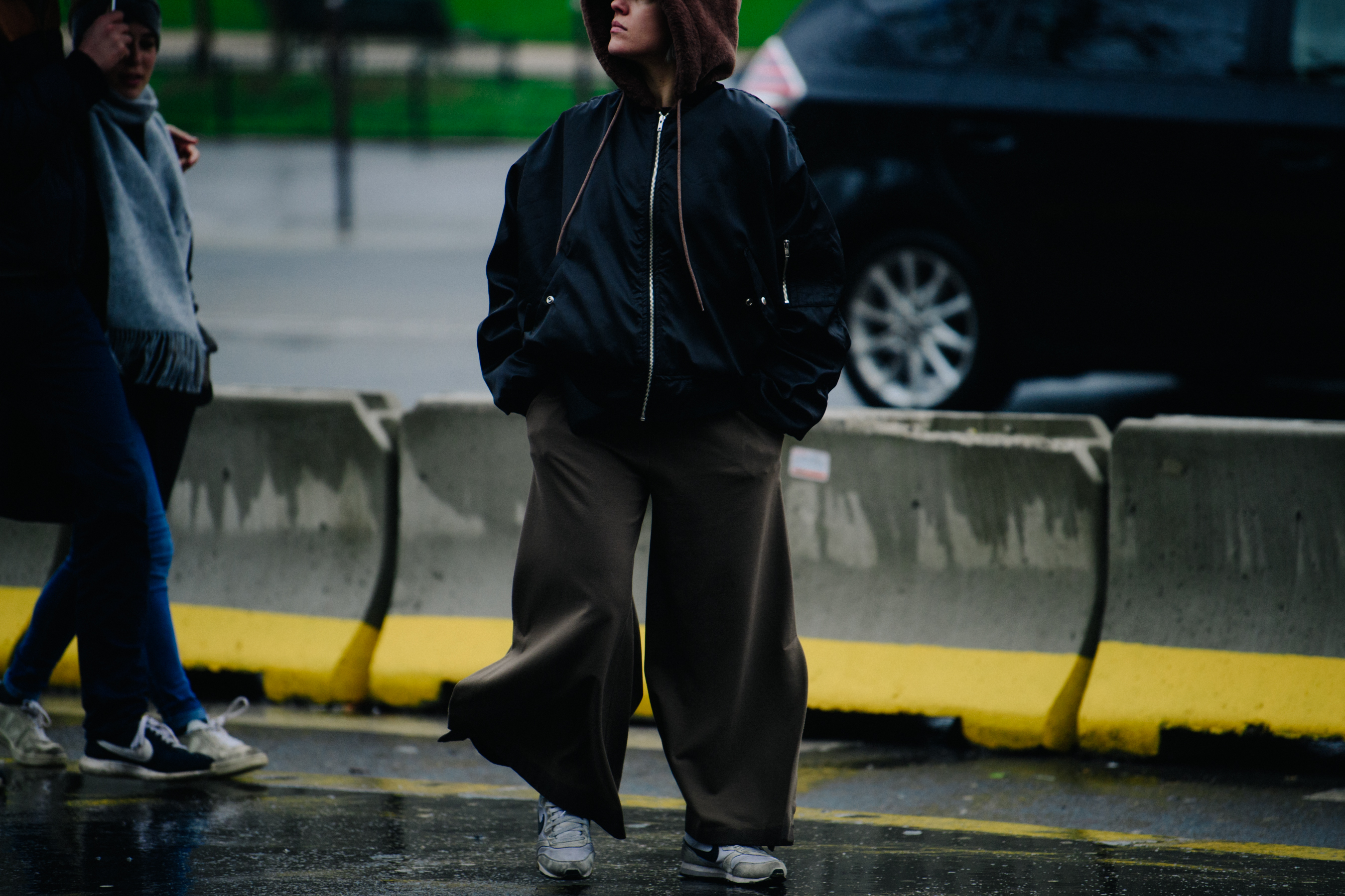 Woman wearing brown wide pants