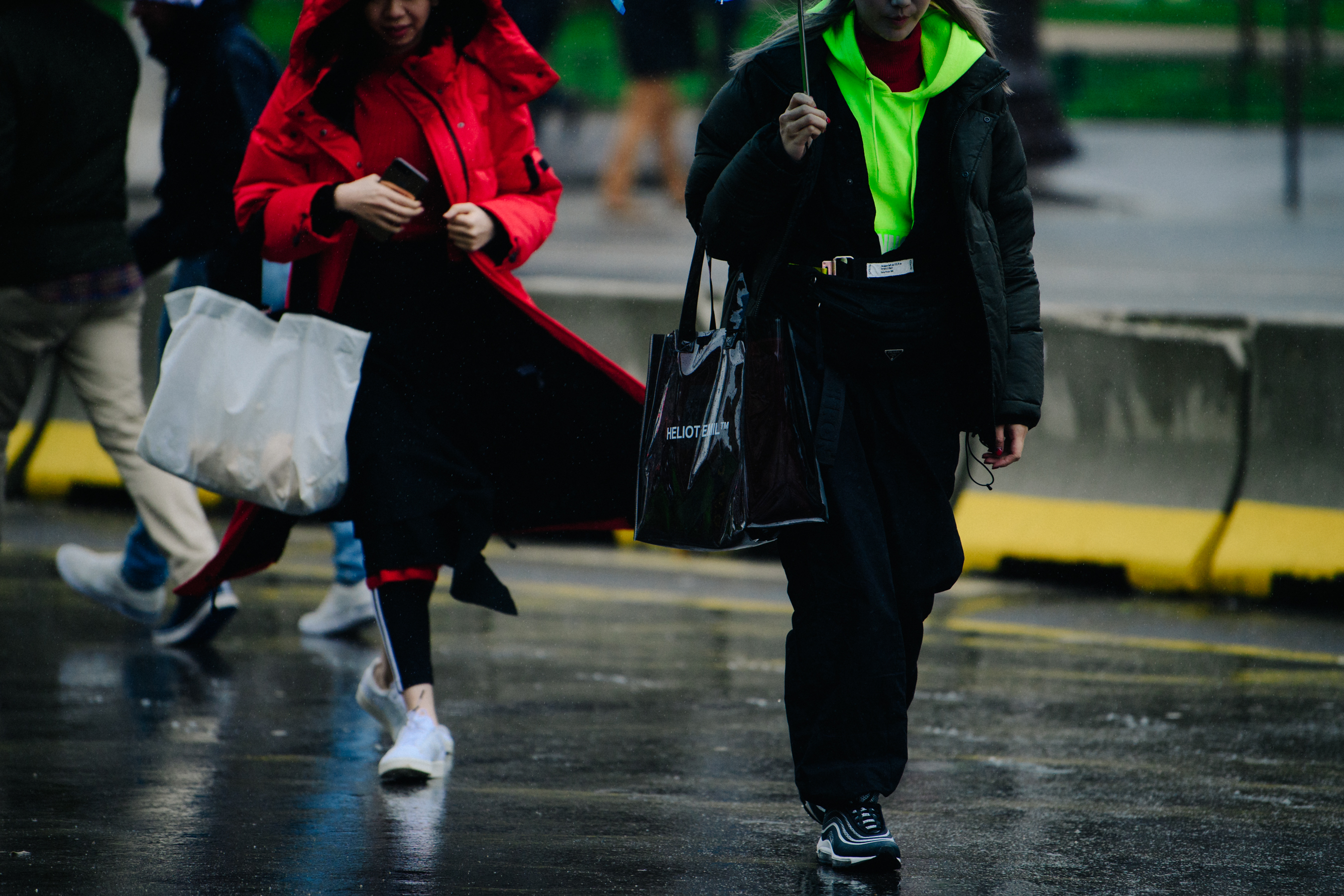 Two girls wearing bright colour hoodies