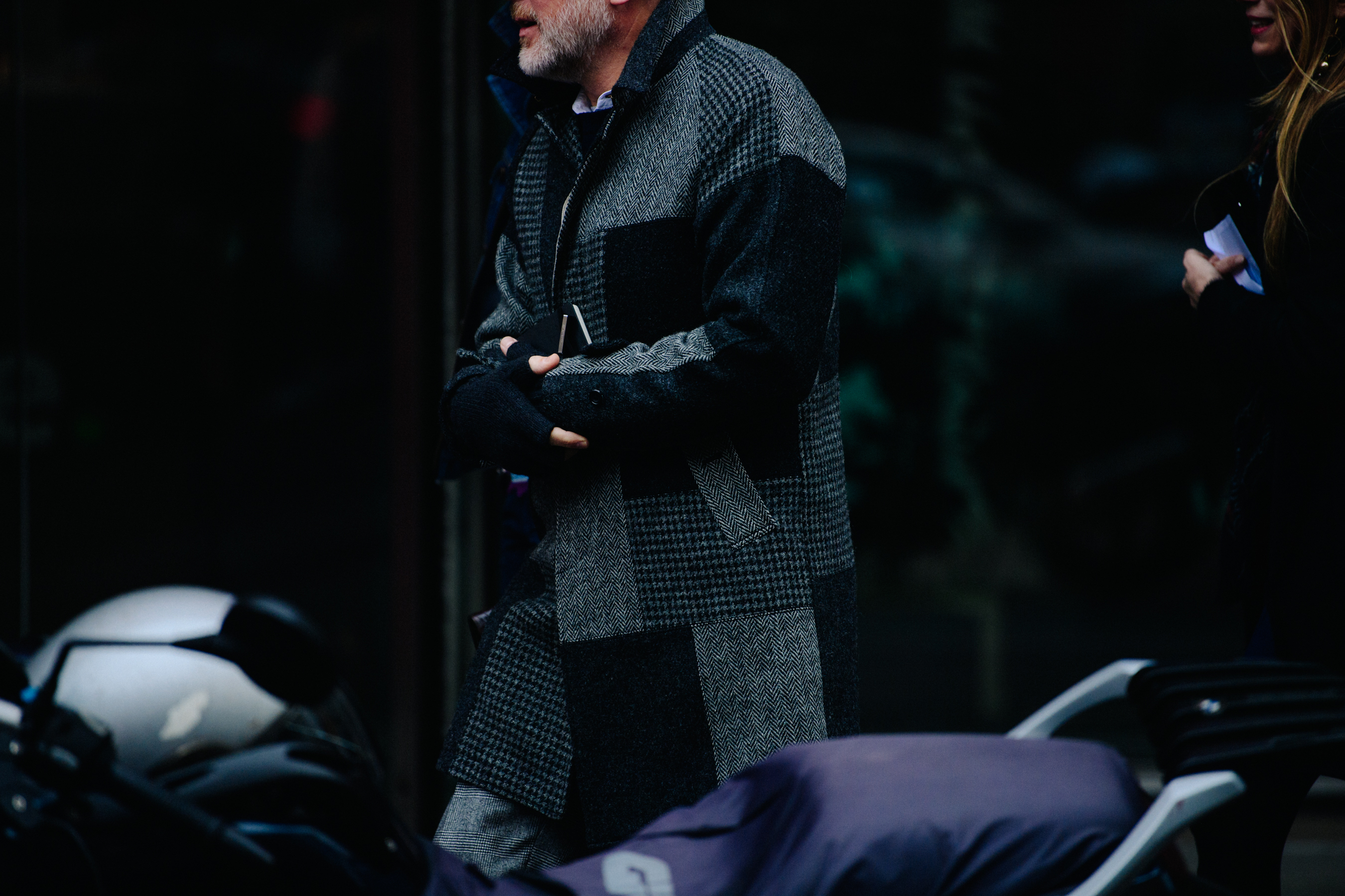 Man wearing grey patch coat