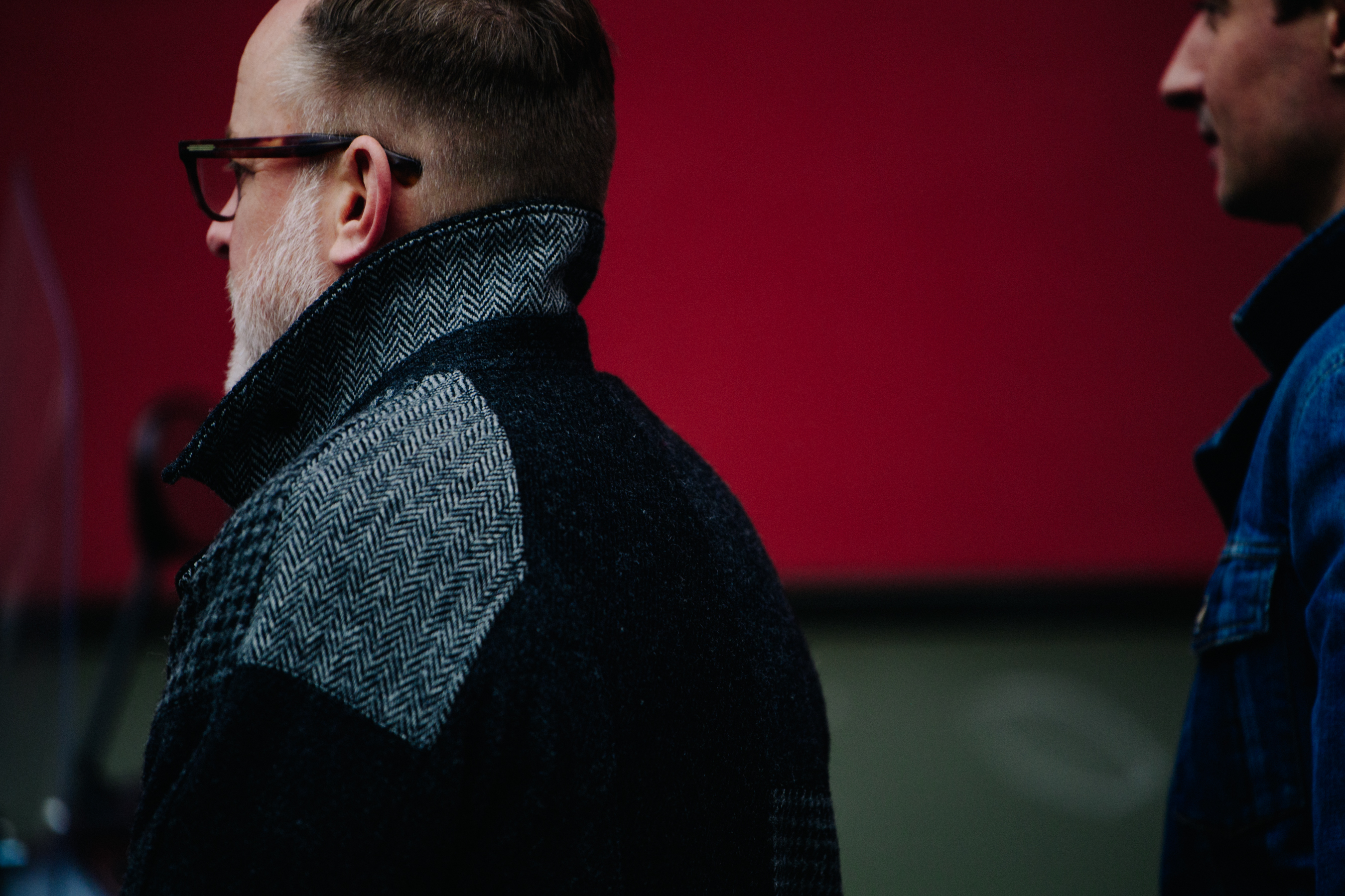 Man wearing grey patch coat