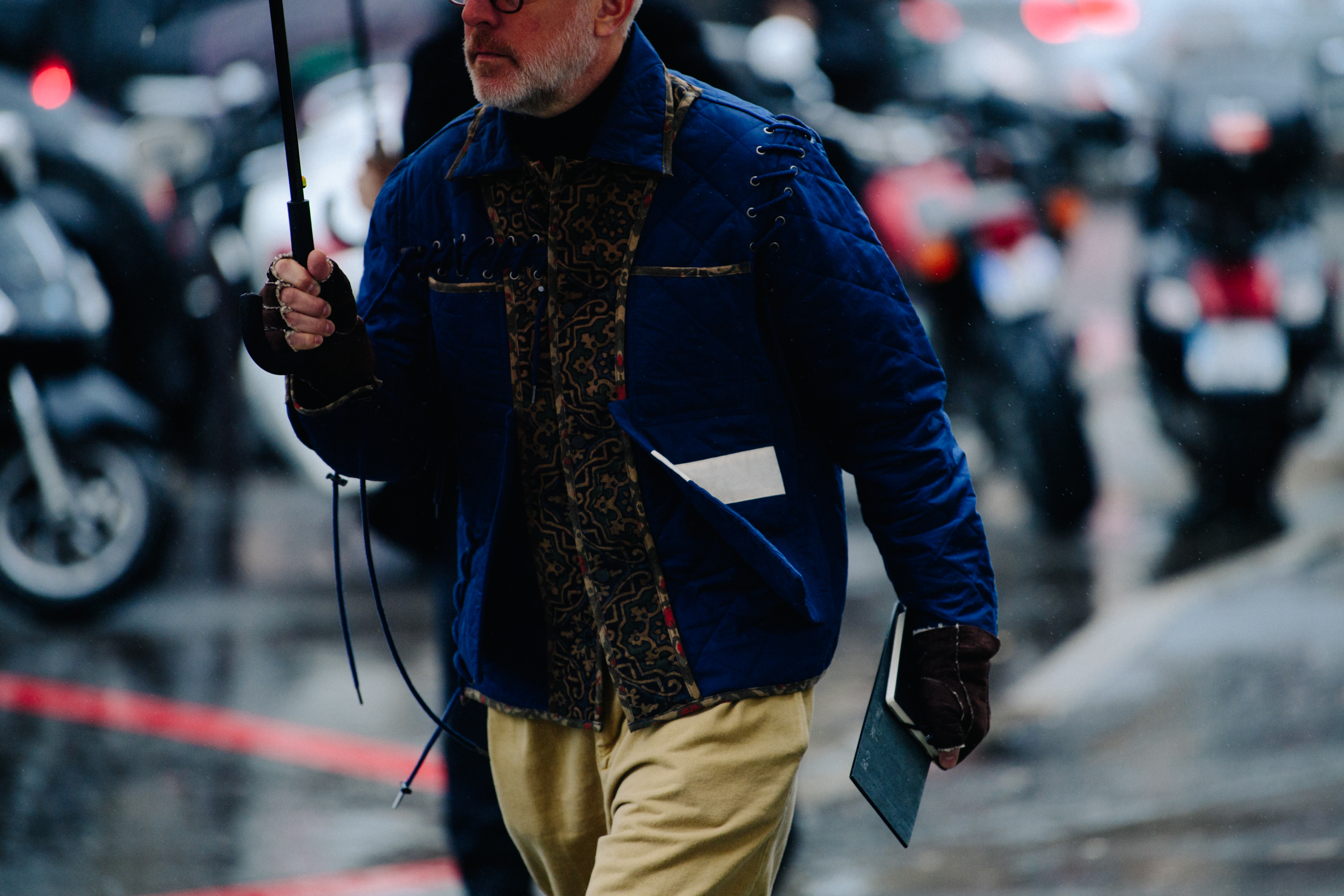 Man wearing blue Craig Green jacket
