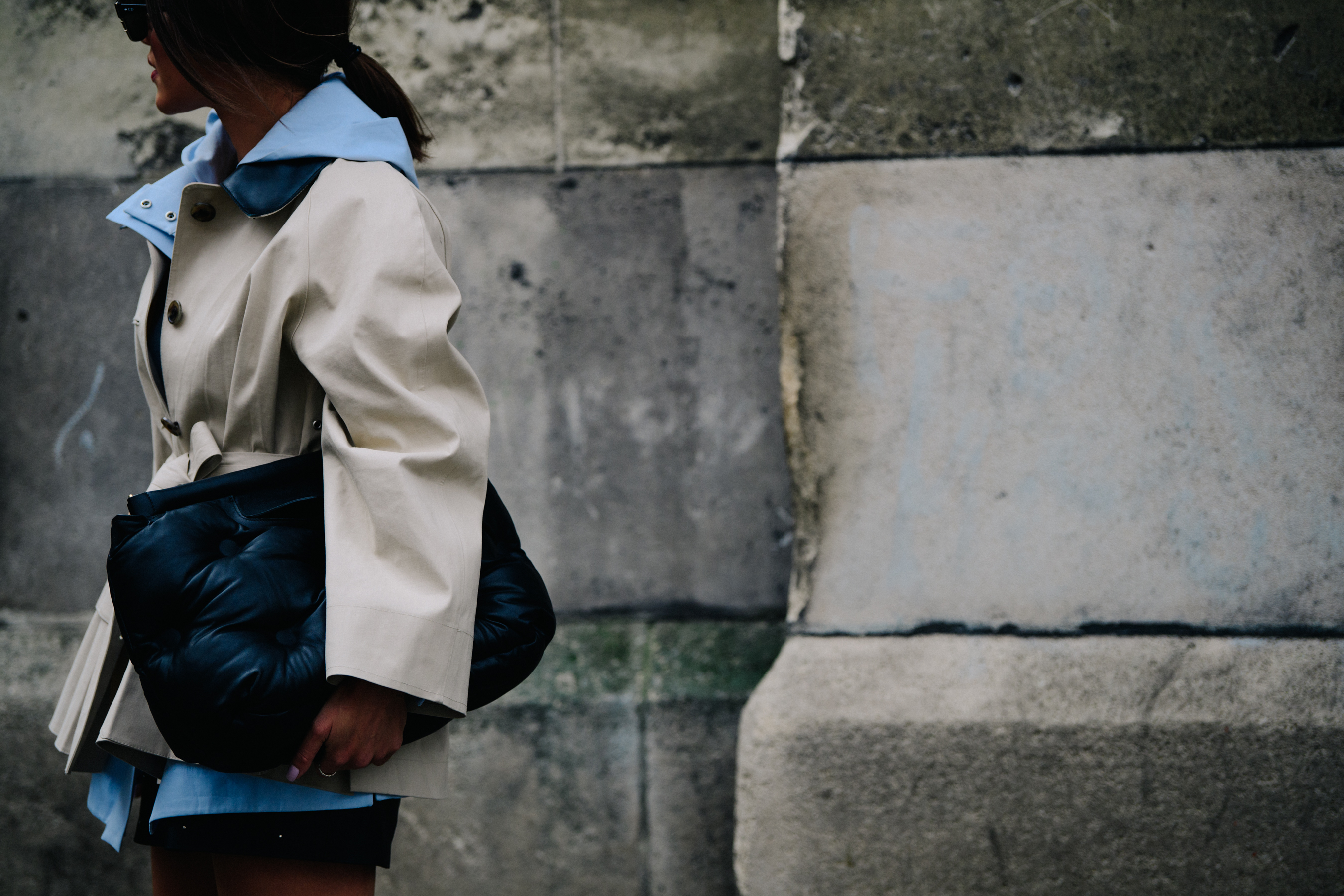 Blogger wearing blue and tan coat