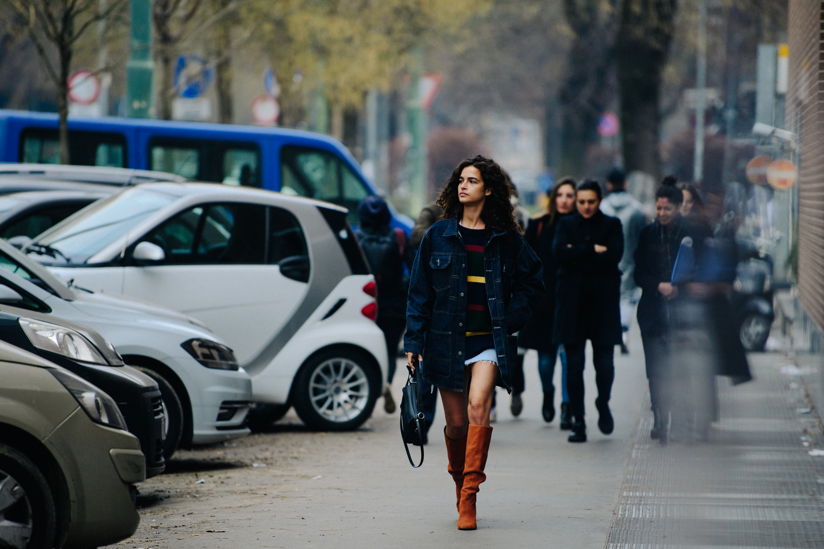 Italian model wearing denim jacket