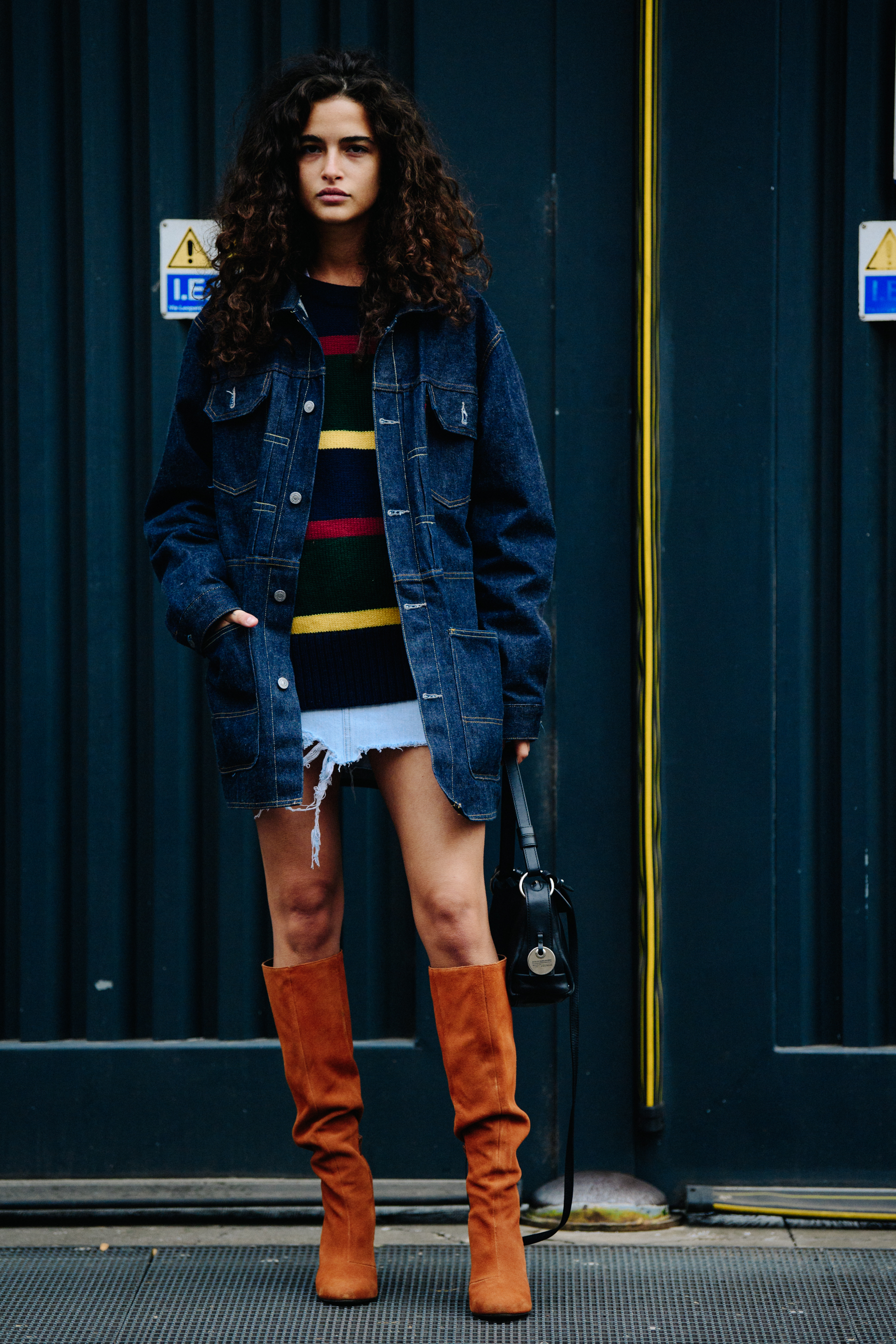 Italian model wearing denim jacket