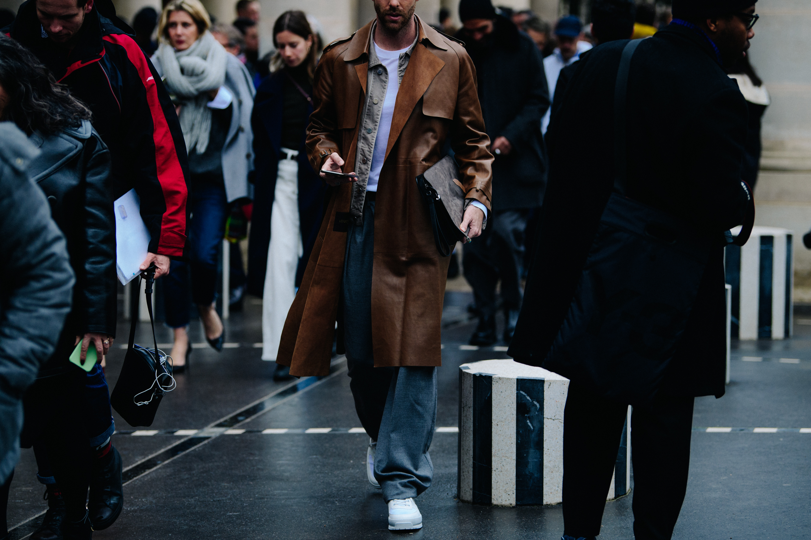 Australian blogger wearing long brown leather coat