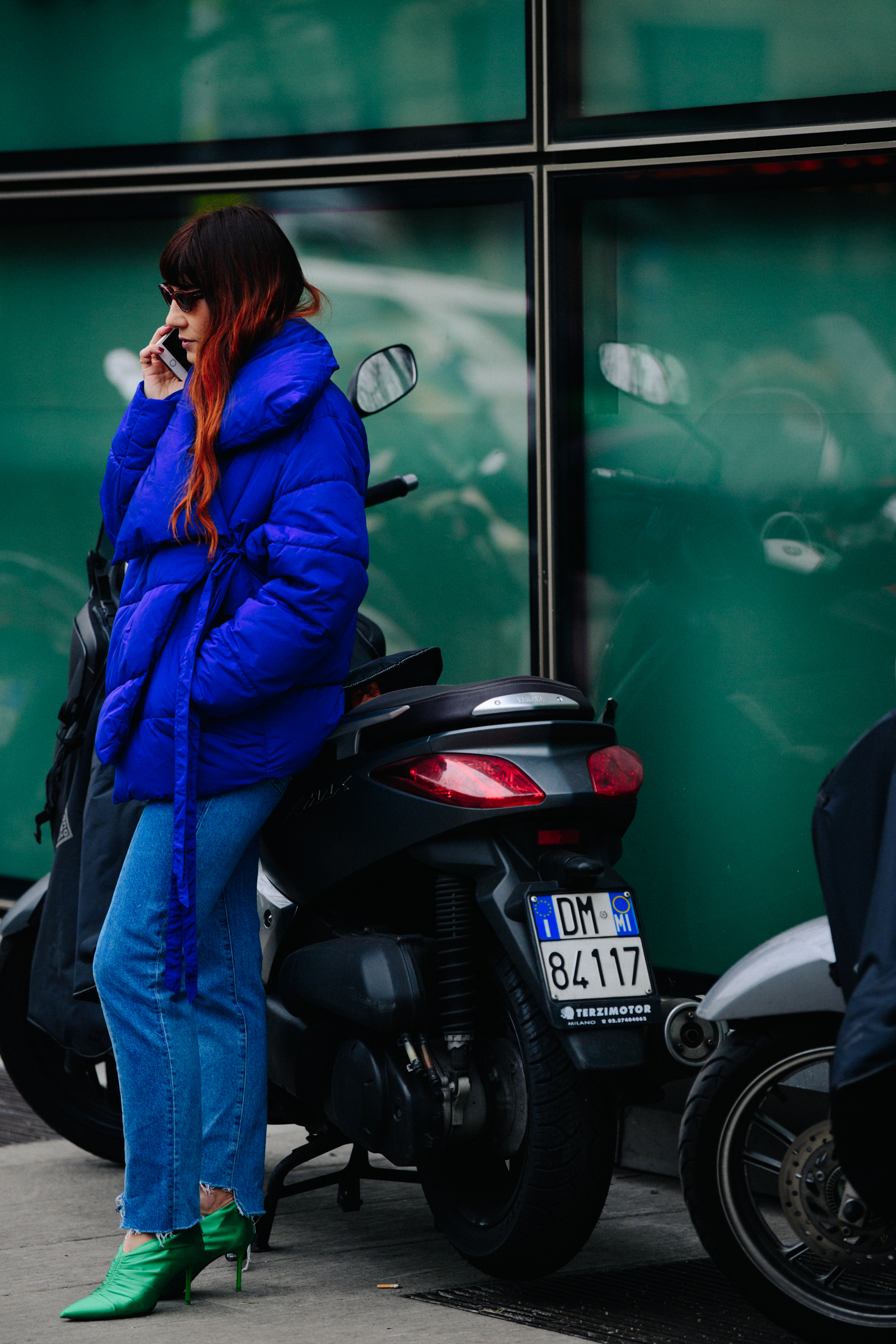 Woman wearing blue puffer coat
