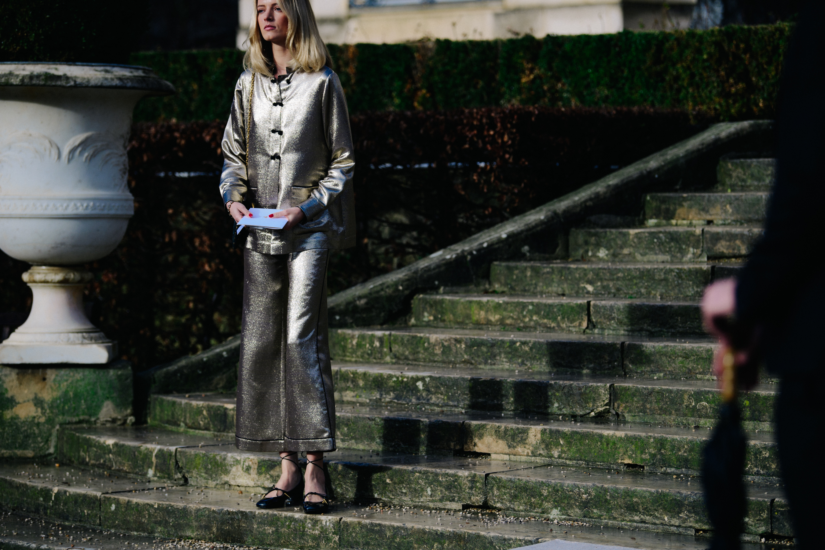 Woman wearing gold glitter outfit
