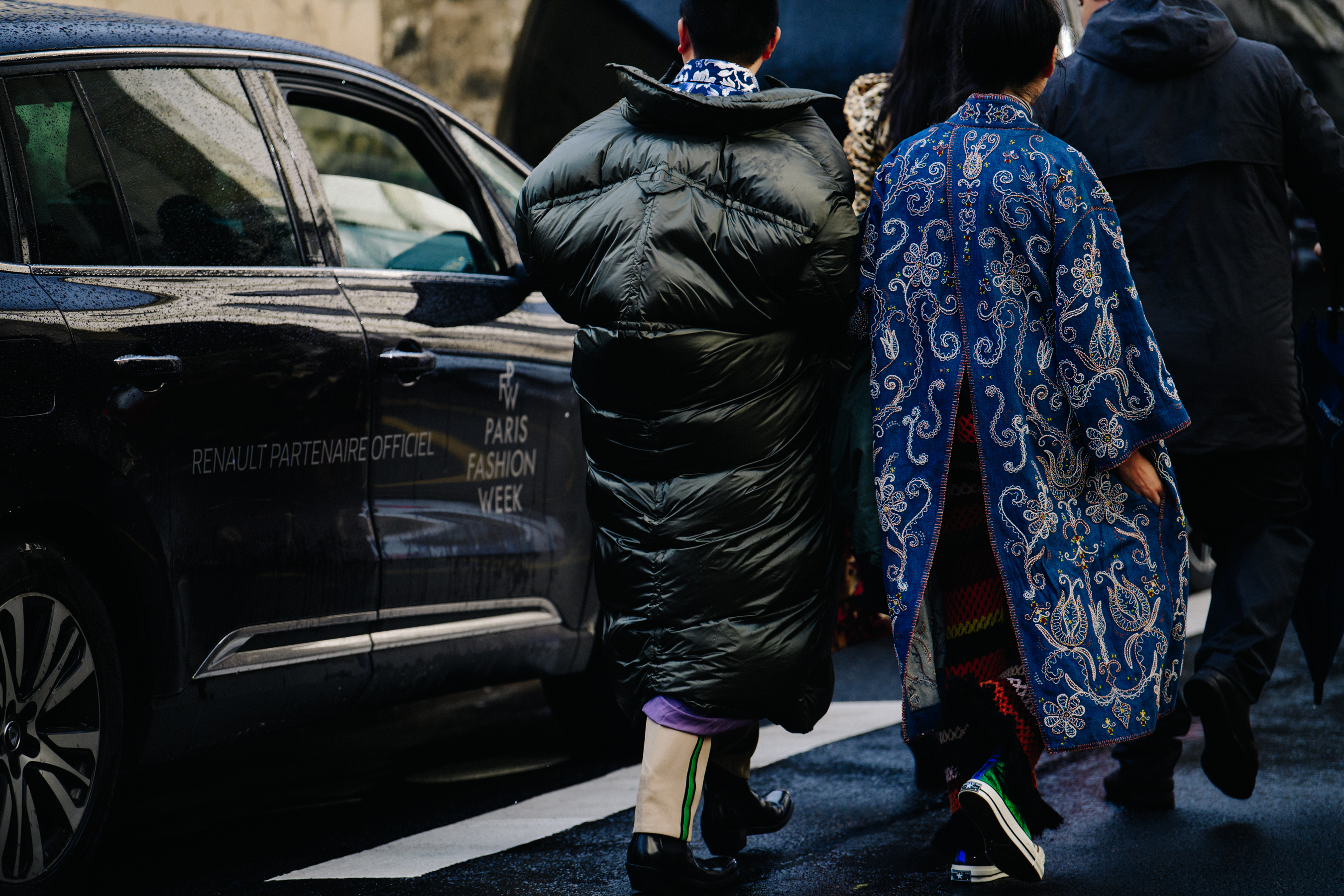 Chinese couple wearing colourful outfits