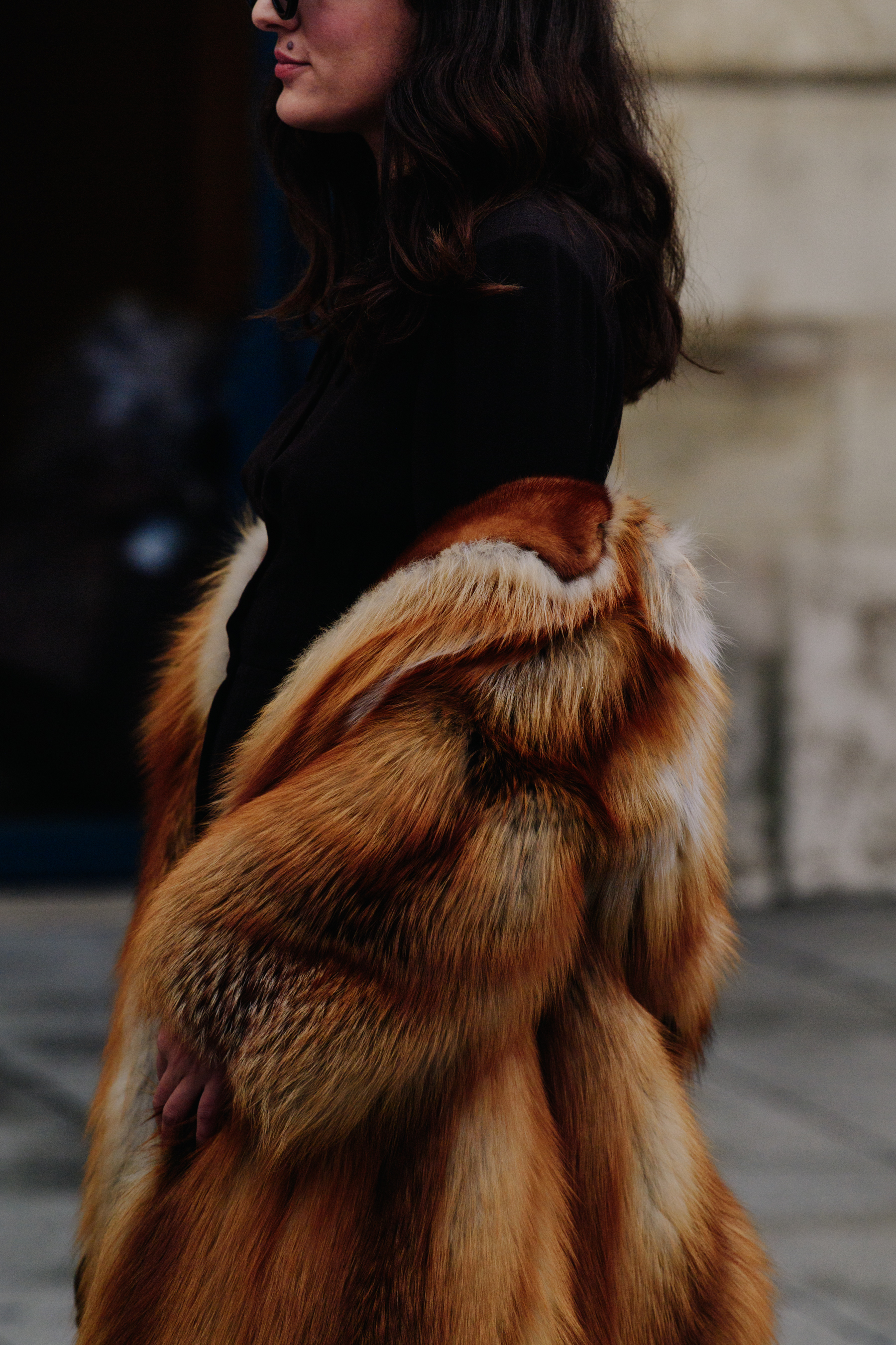 Woman wearing brown fur coat