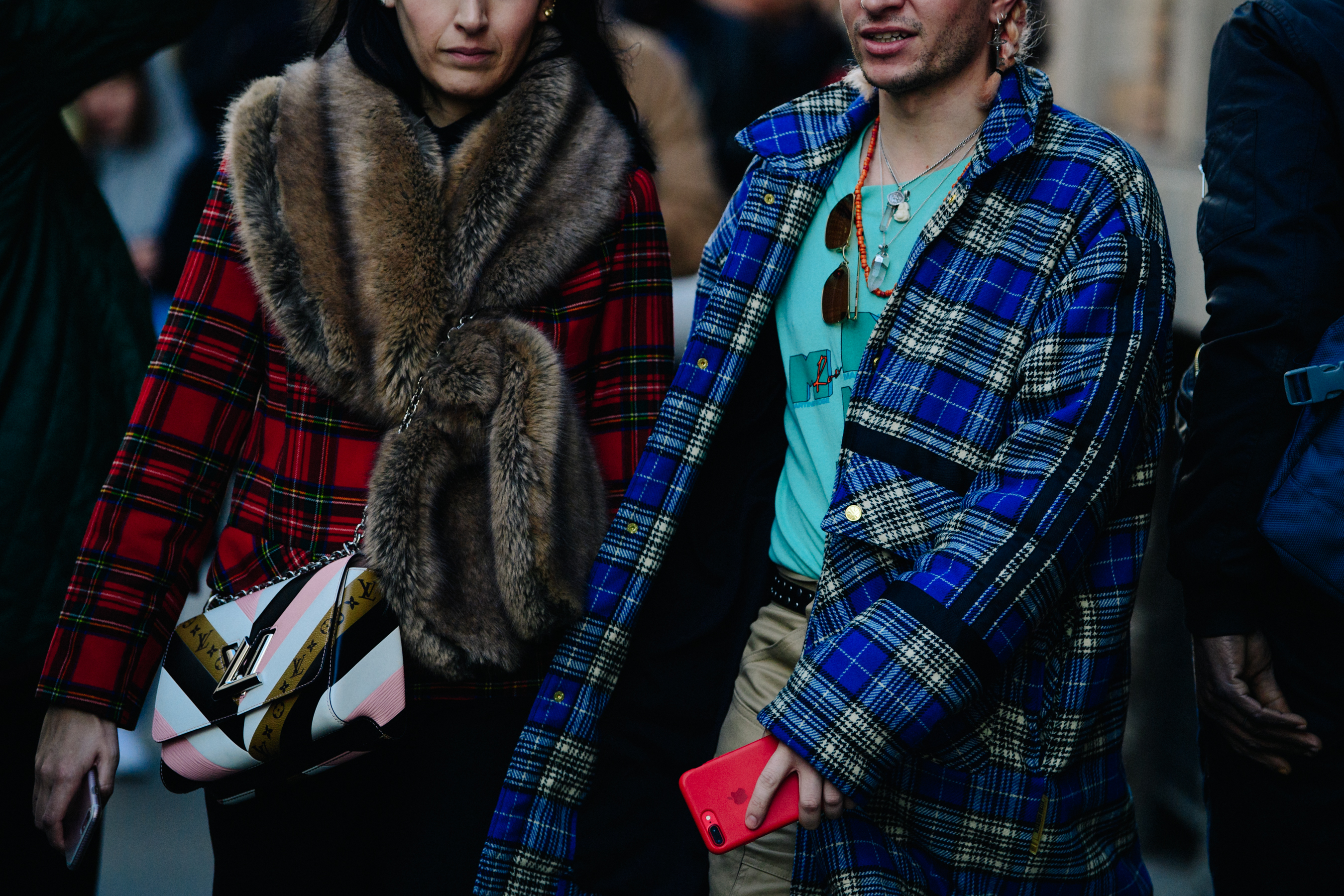 Two British journalists wearing check shirts