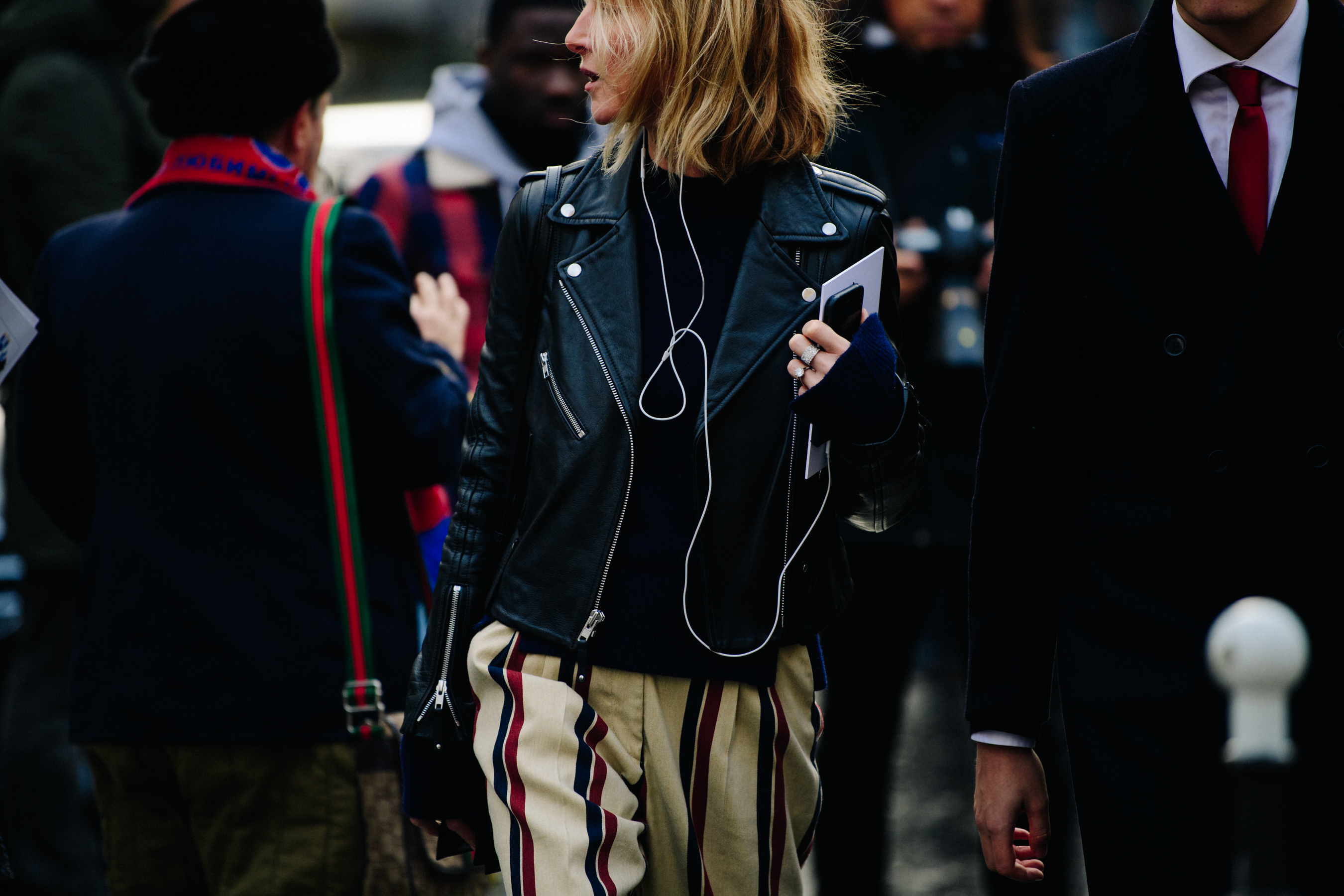 Blonde woman wearing leather jacket