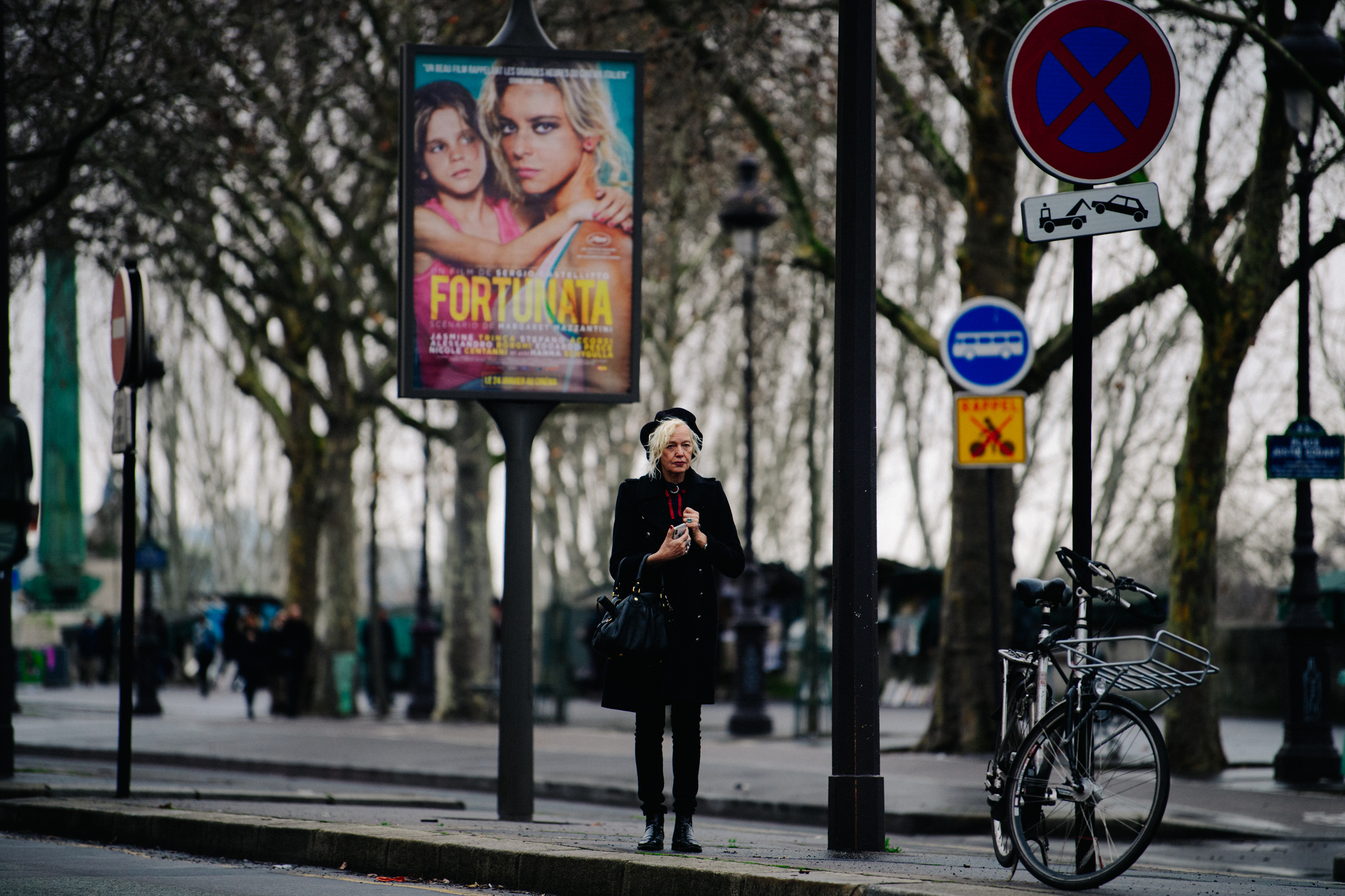 German photographer wearing black outfit