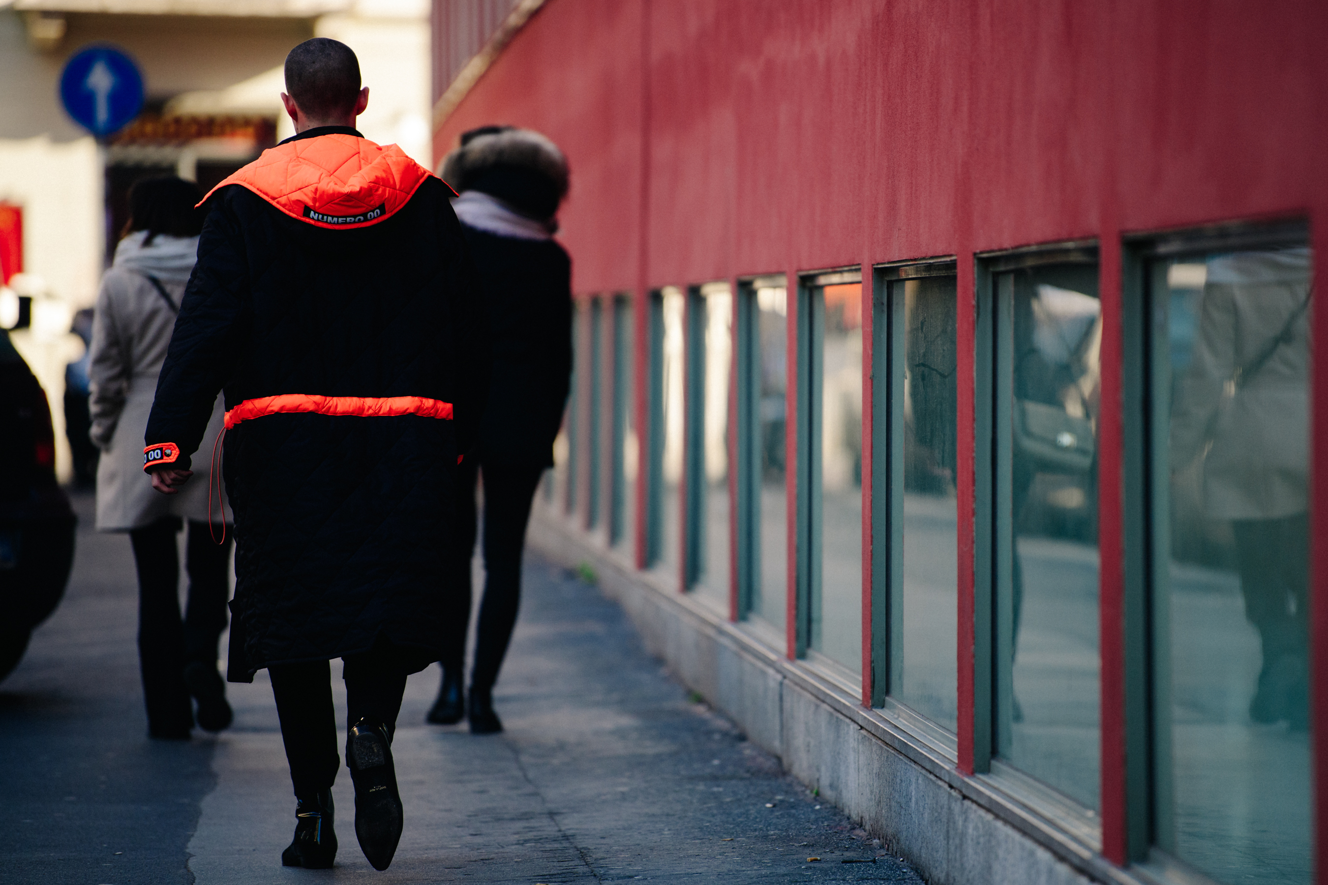 Man wearing long black coat