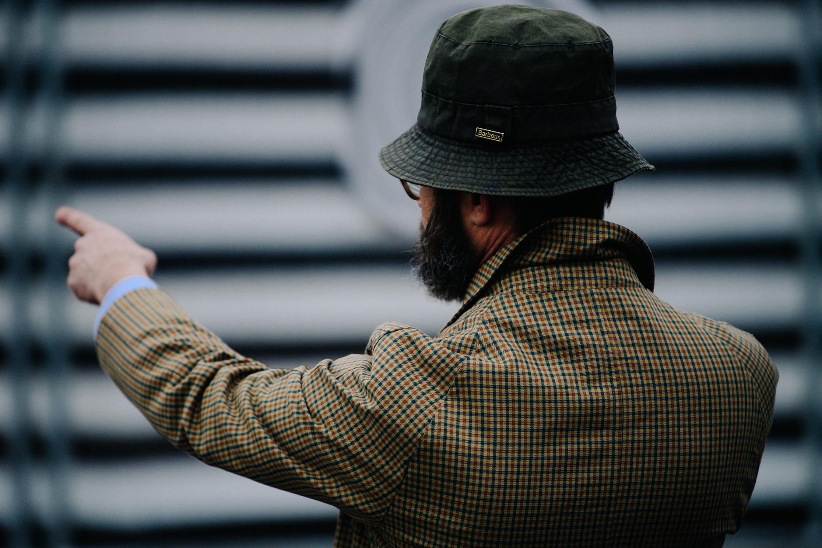 Man wearing Barbour hat