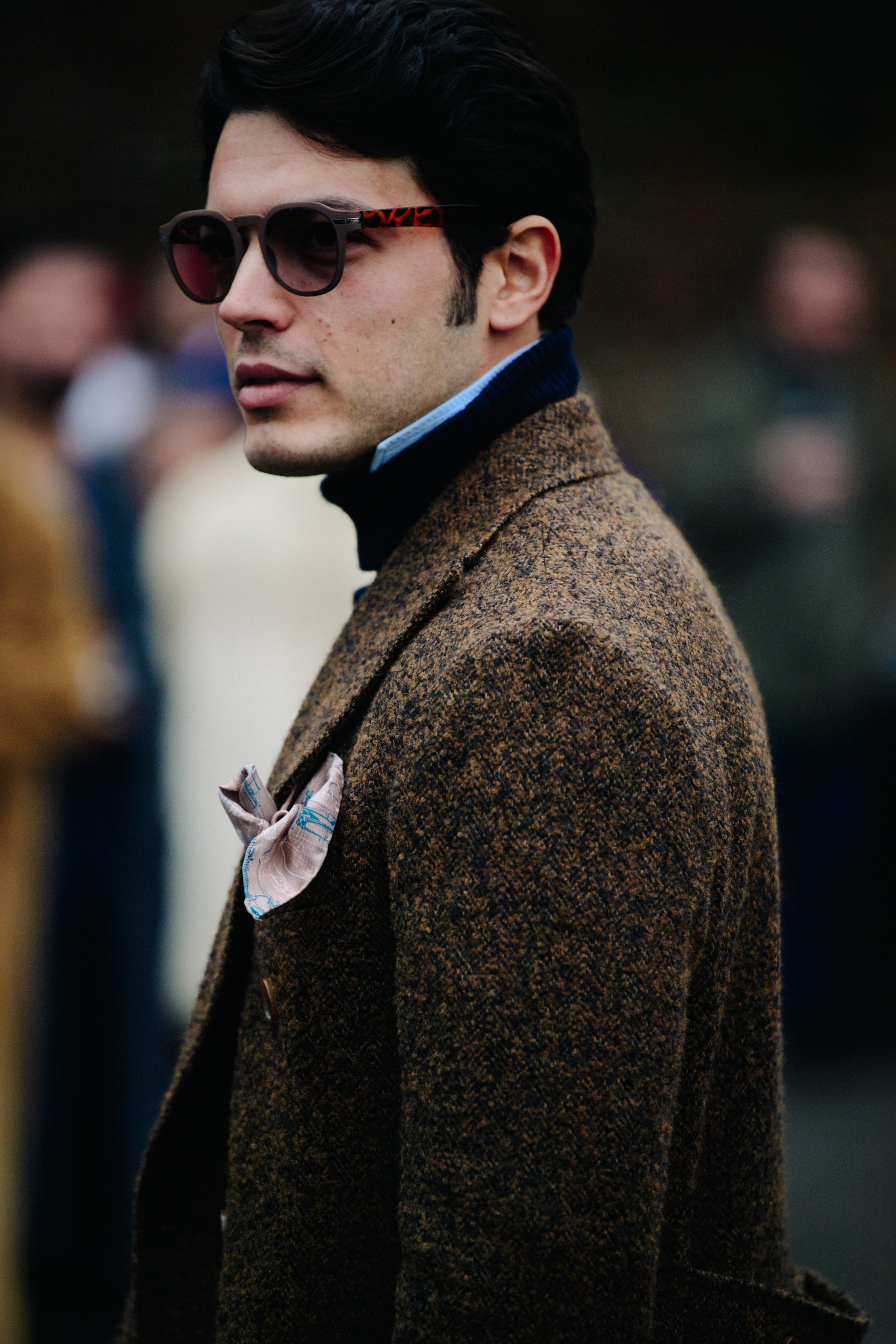 Asian man wearing brown wool jacket