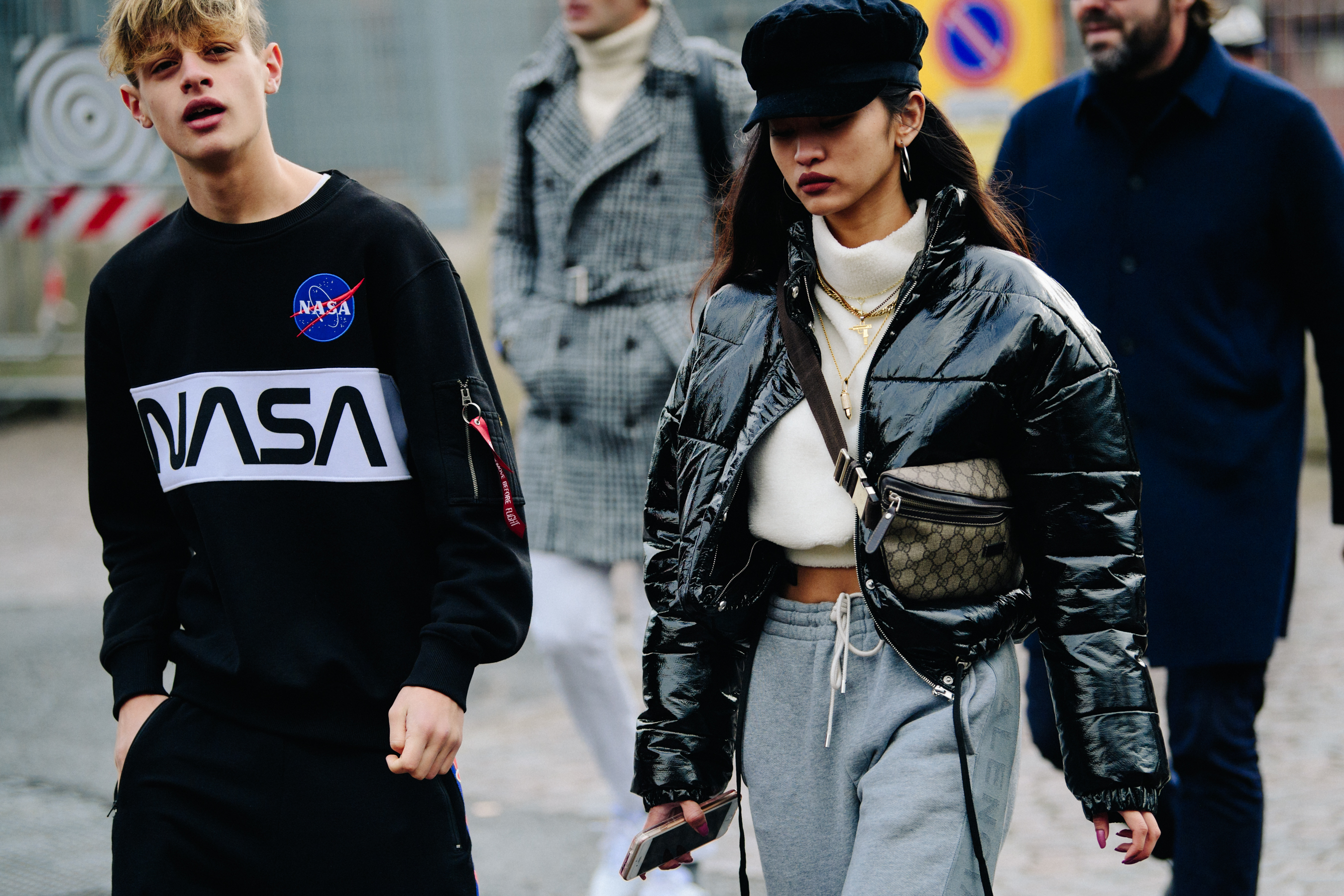 Couple wearing black streetwear