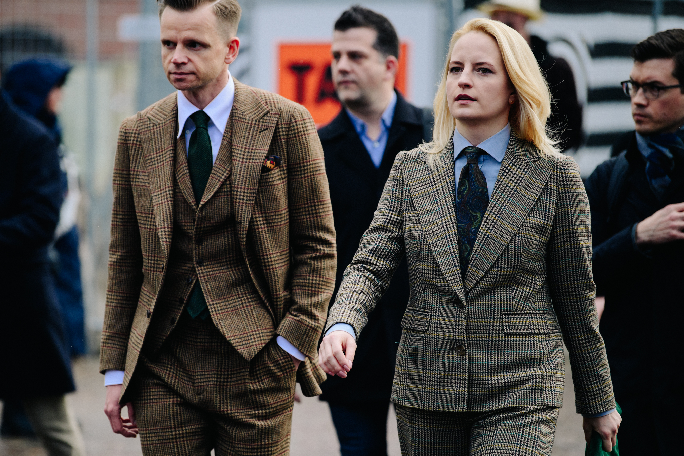 Couple wearing matching suits