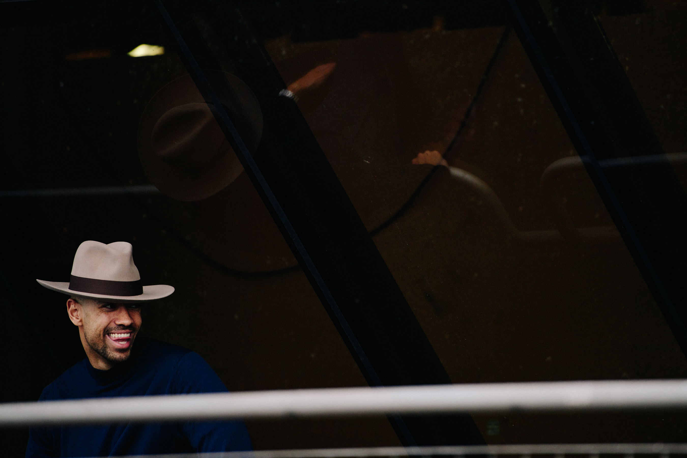 Man wearing rimmed hat
