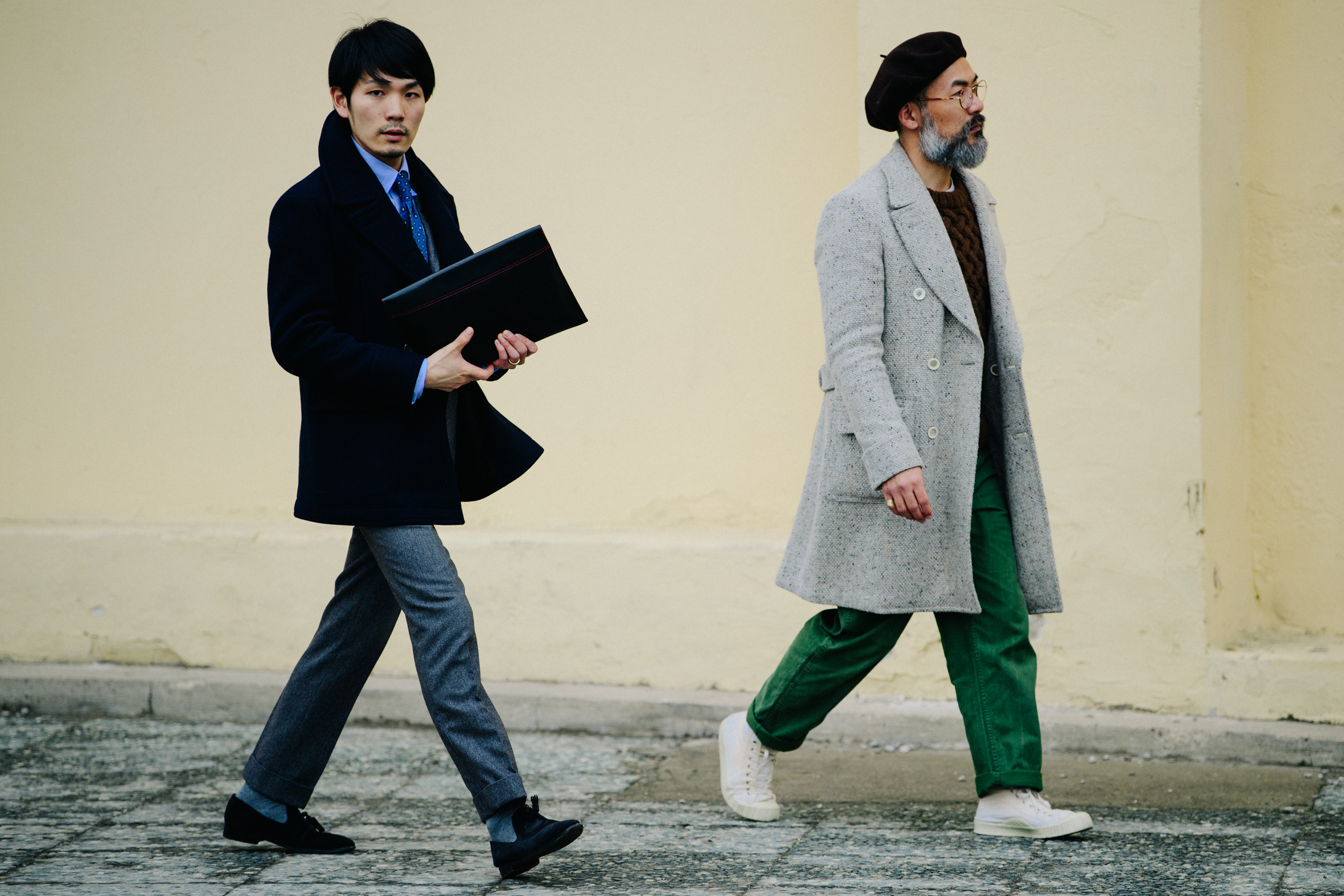 Two Asian men wearing wool coats
