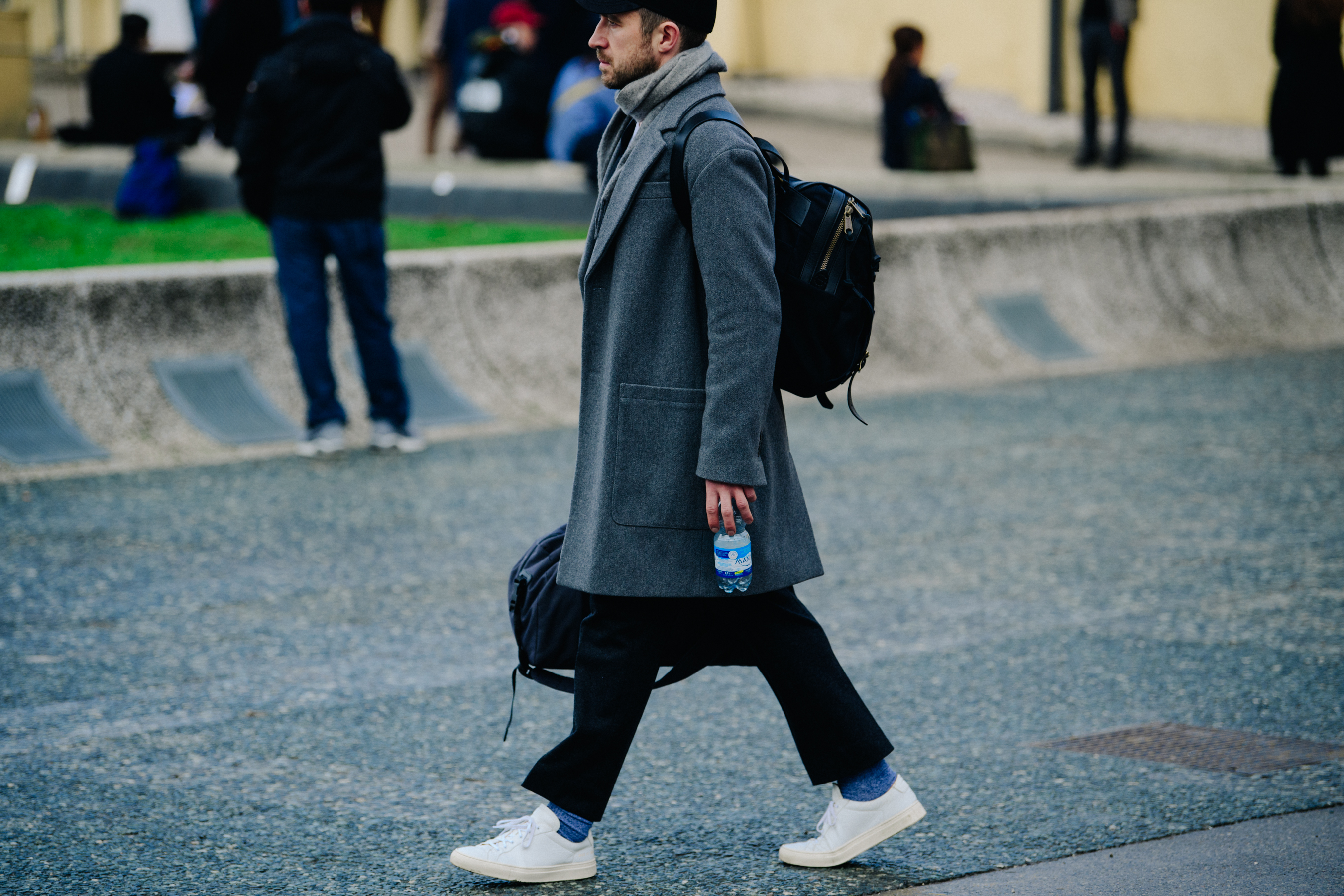Man wearing long wool coat