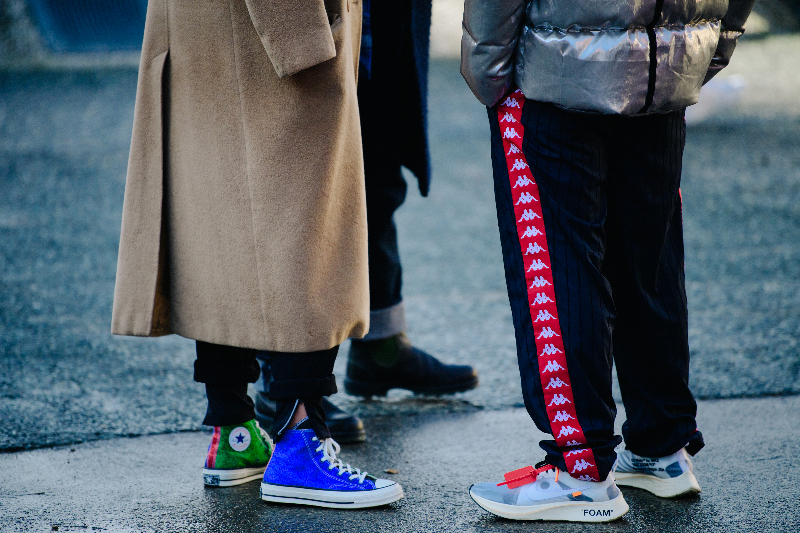Two men wearing colourful sneakers