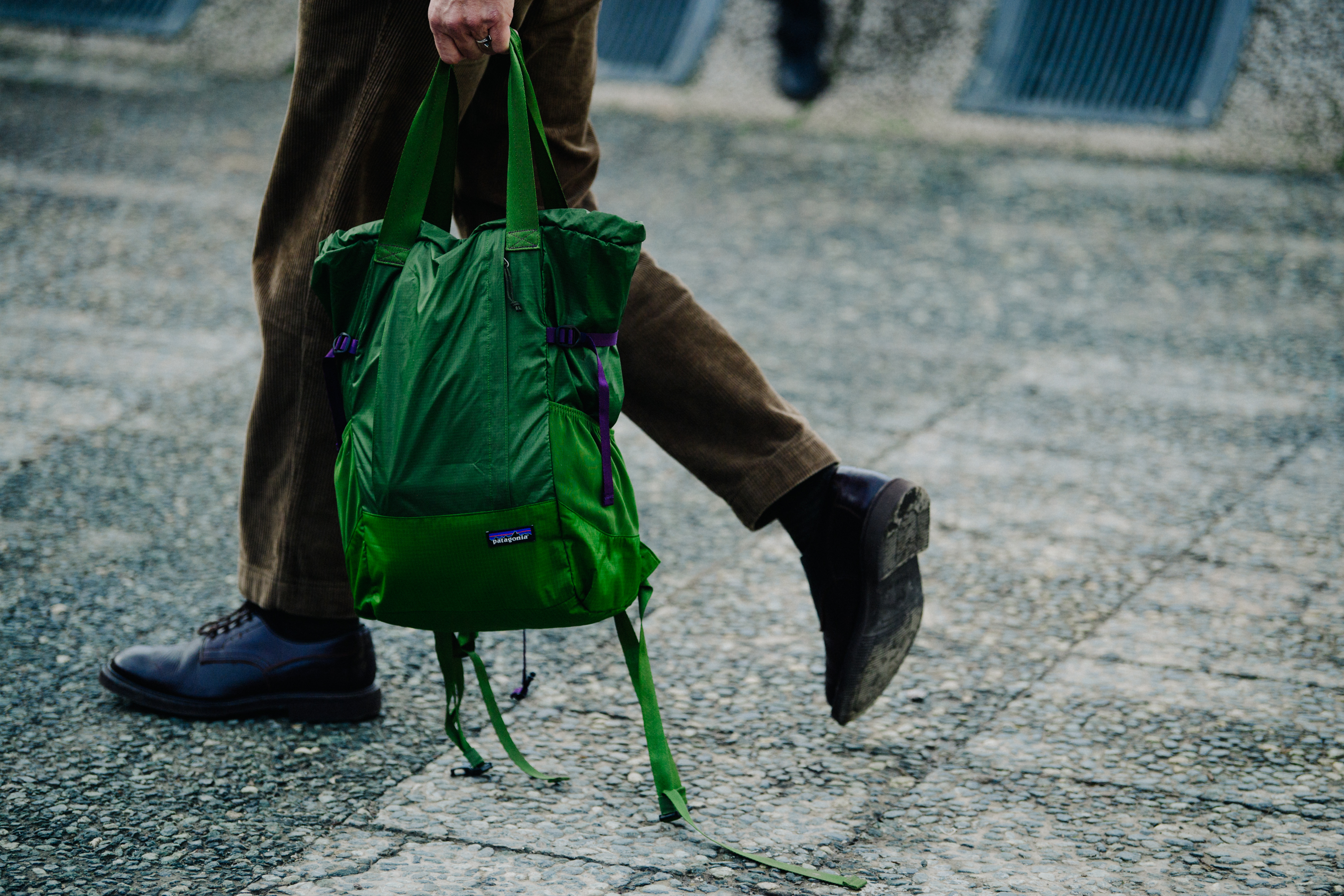 Man carrying green Patagonia bag