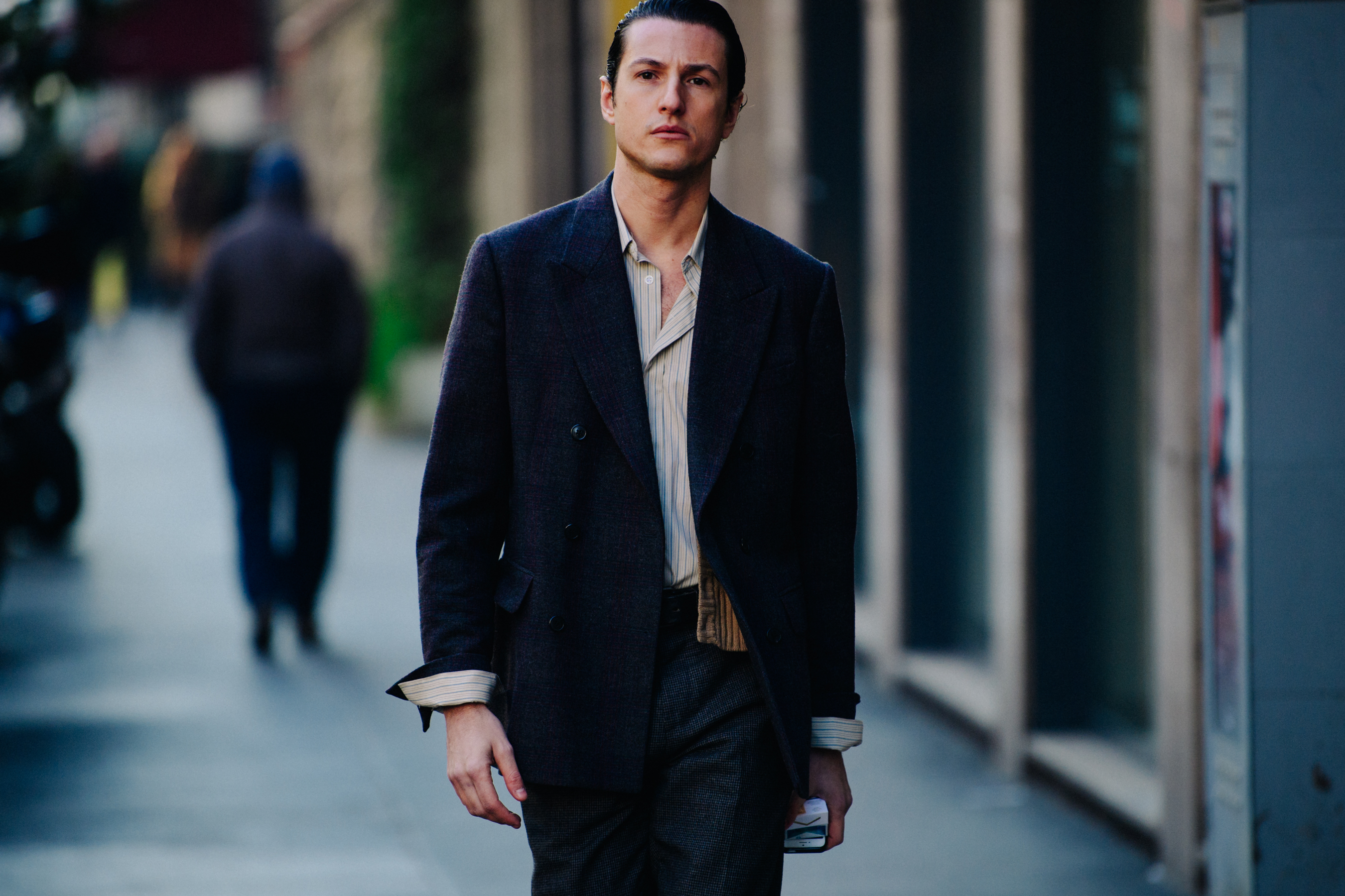 Italian man wearing dark suit