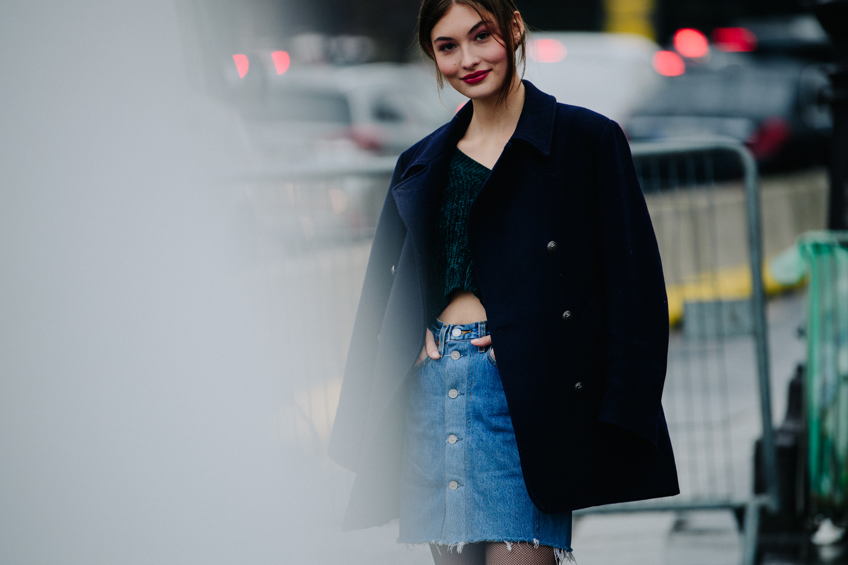 American model wearing denim skirt