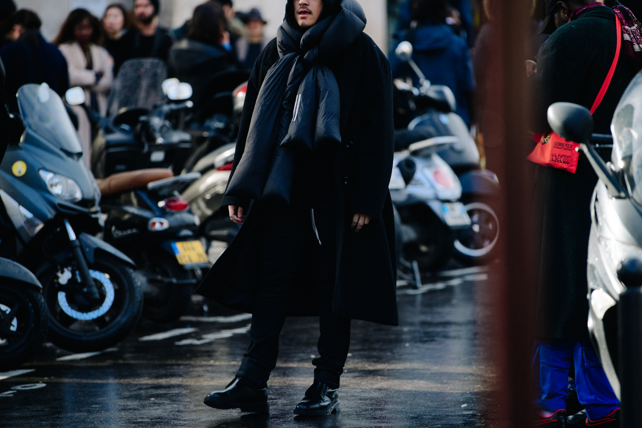 American designer wearing all black