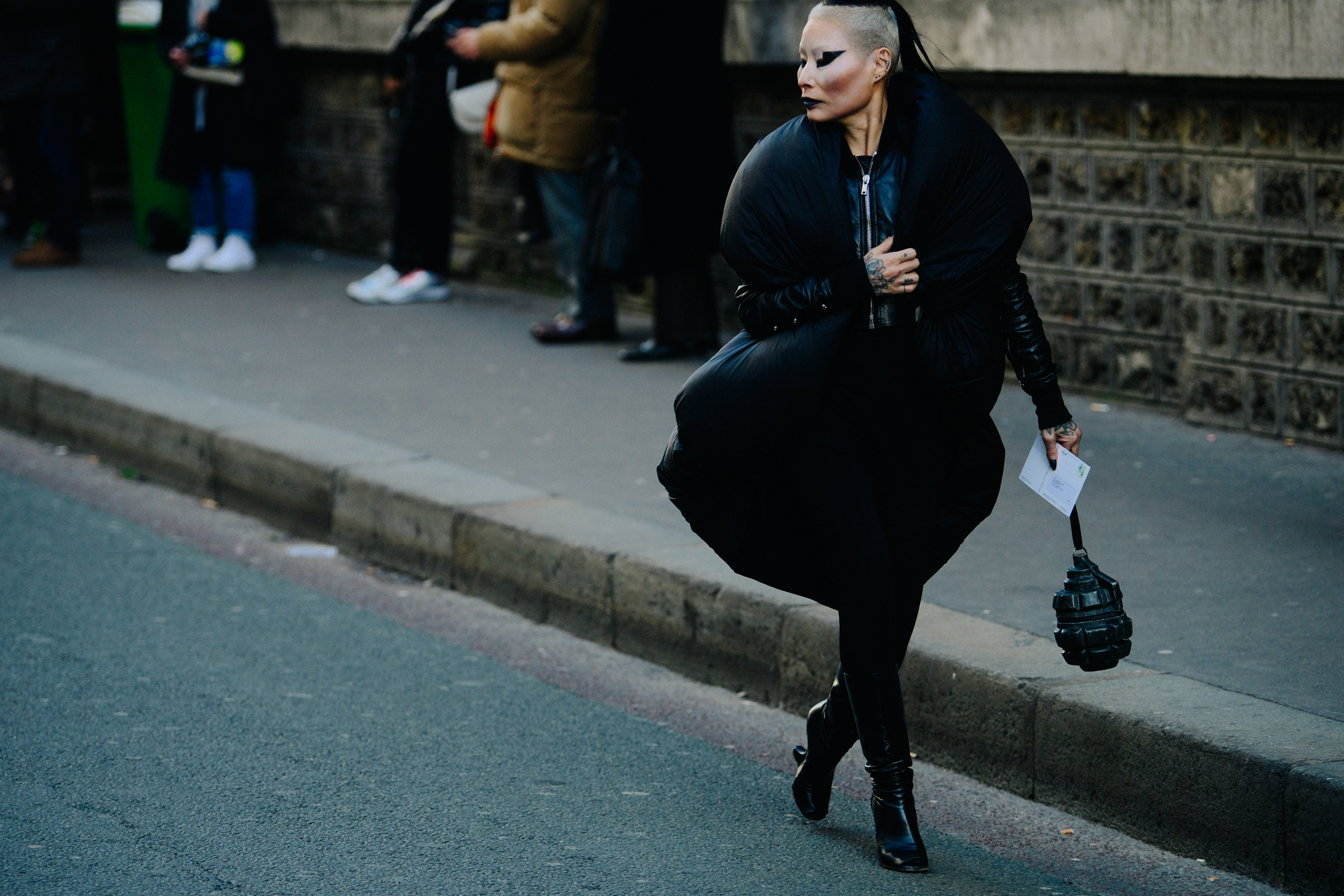 Asian woman wearing all black outfit