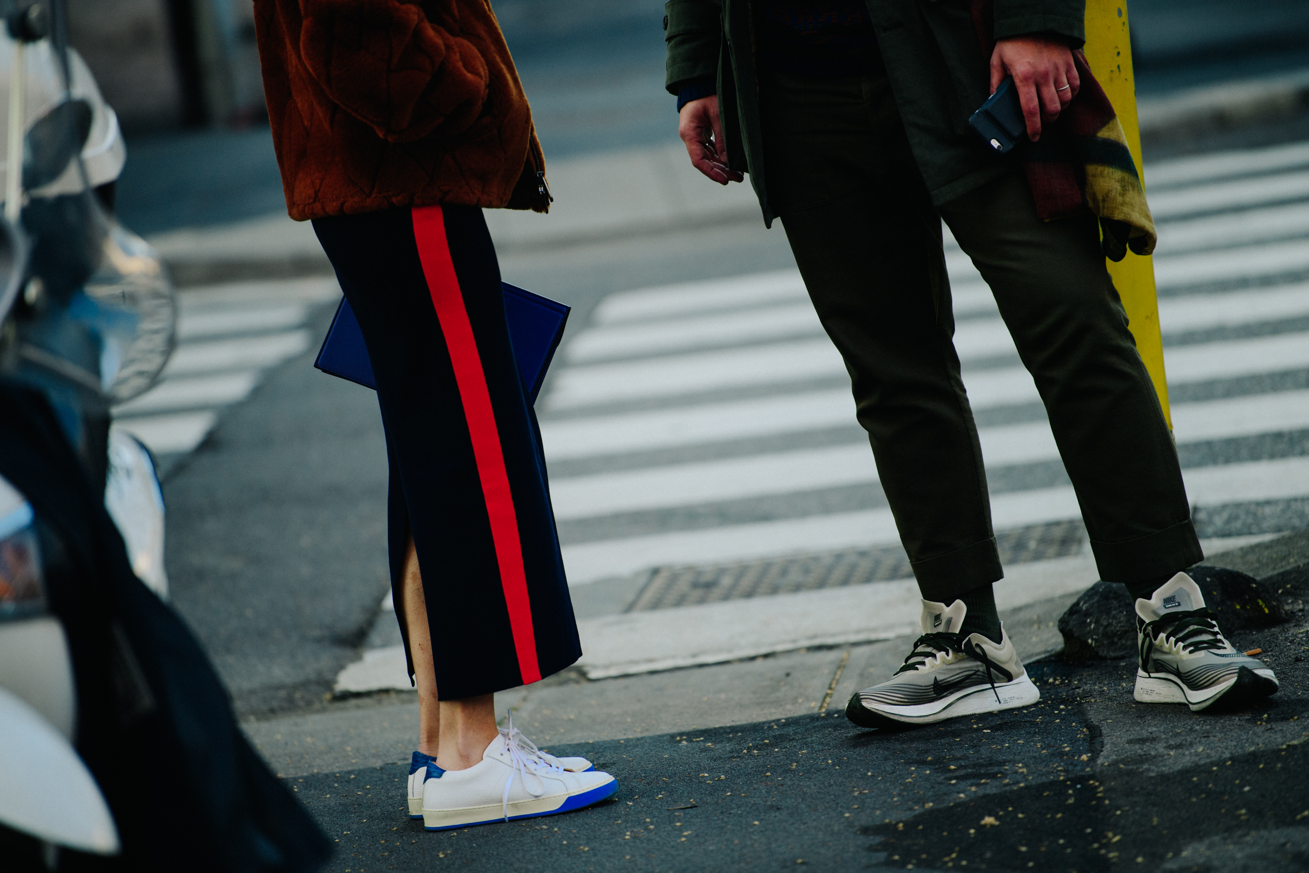 Couple wearing white sneakers