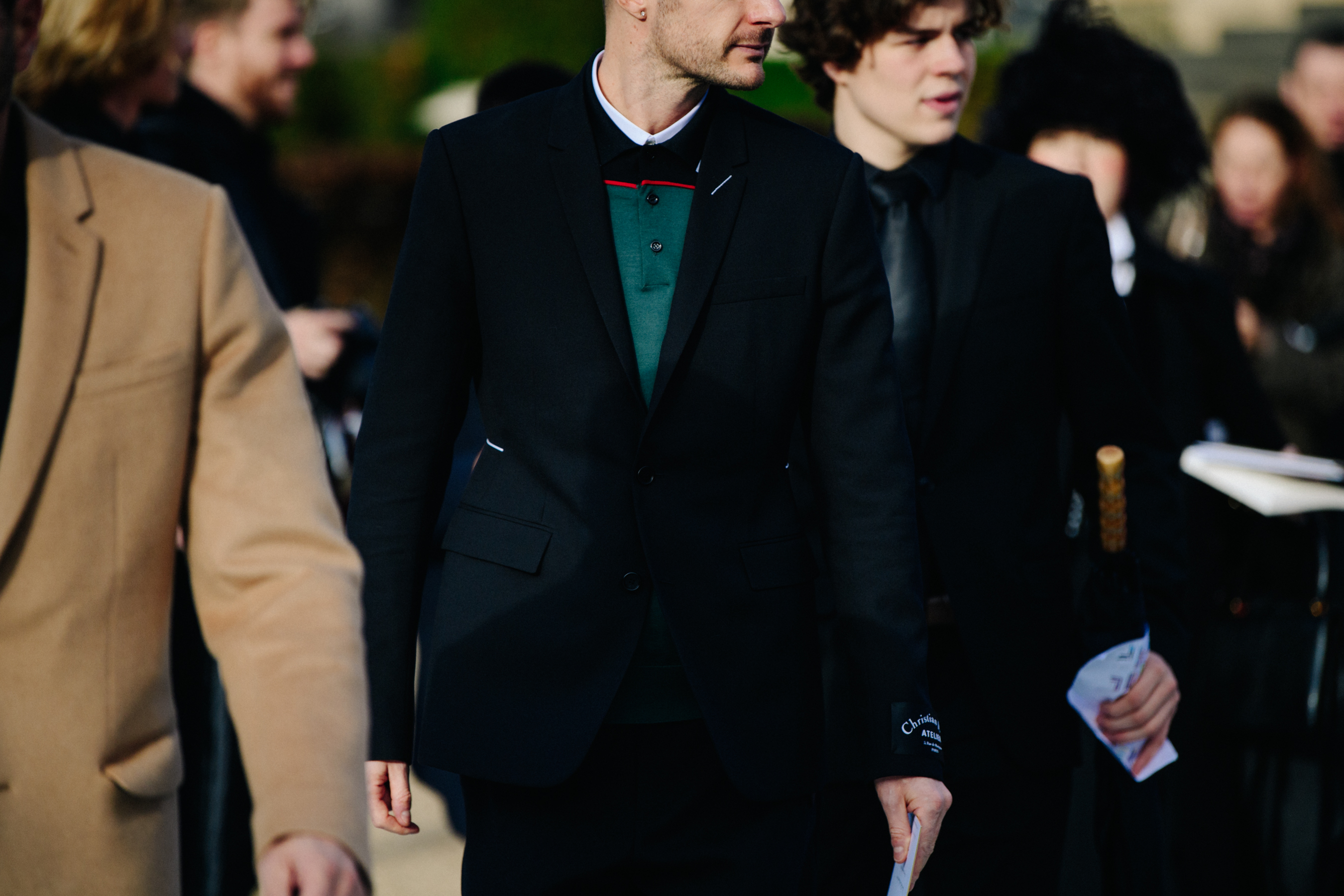 Man wearing green polo shirt