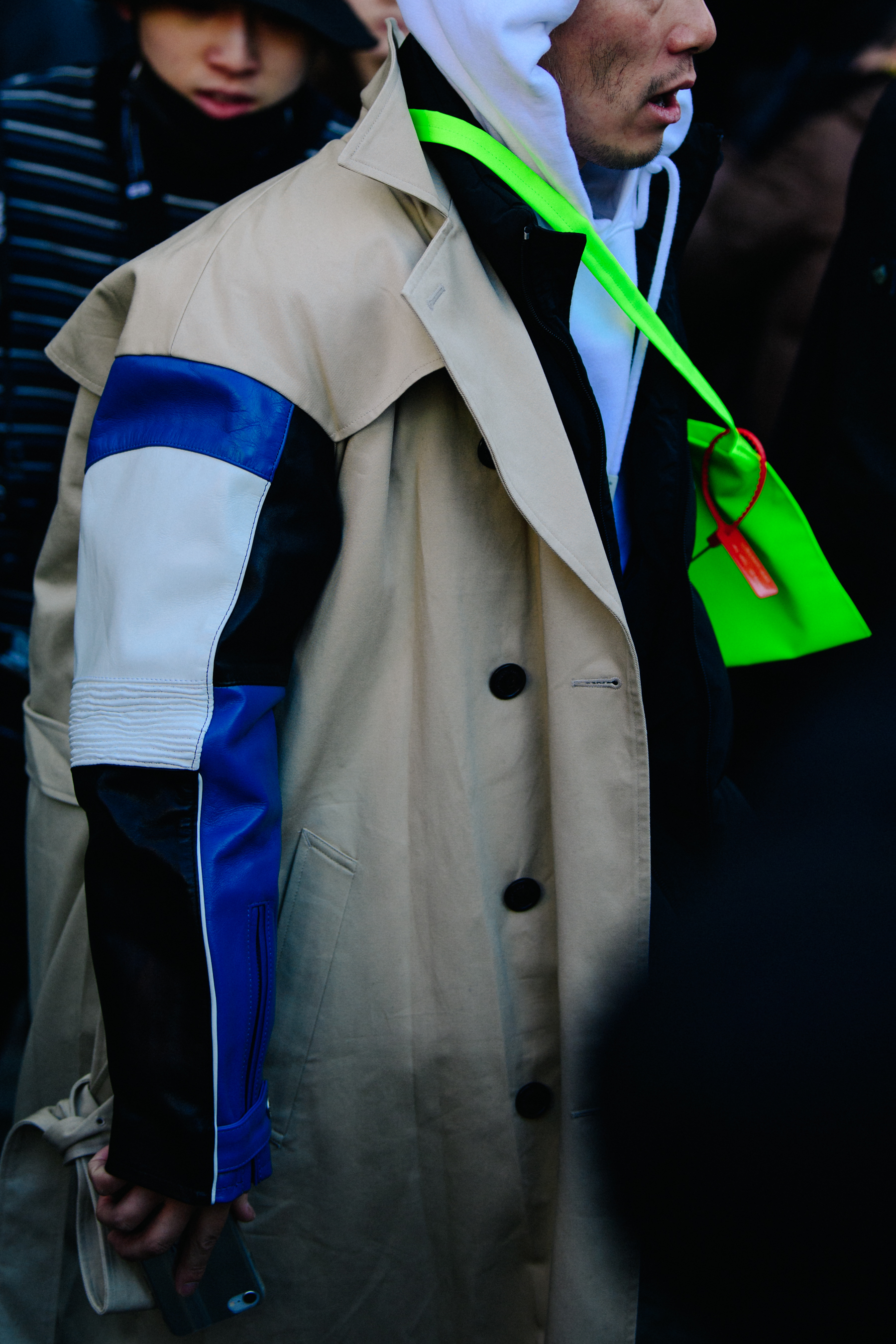 Man wearing green Off-White bag