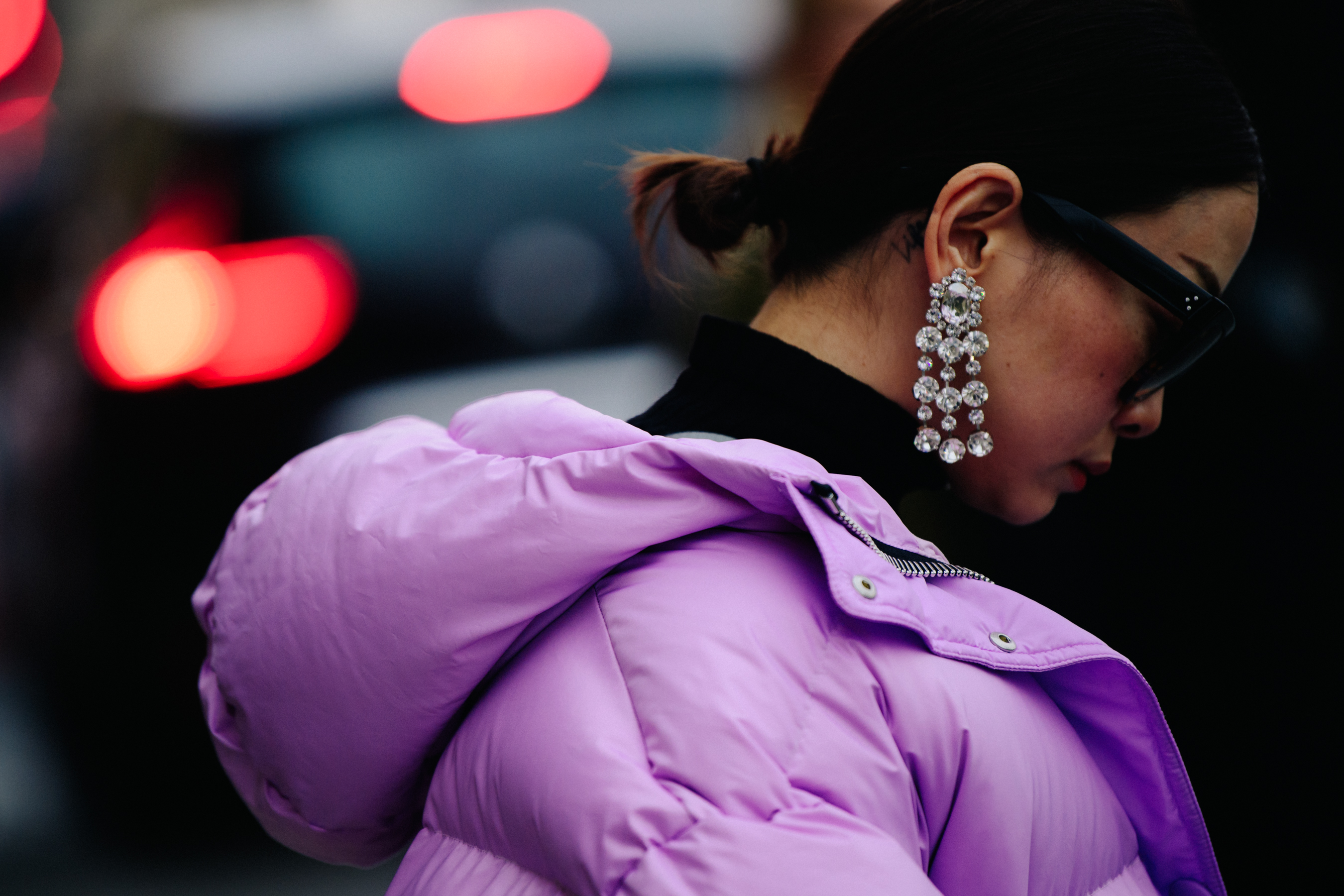 Asian woman wearing purple coat