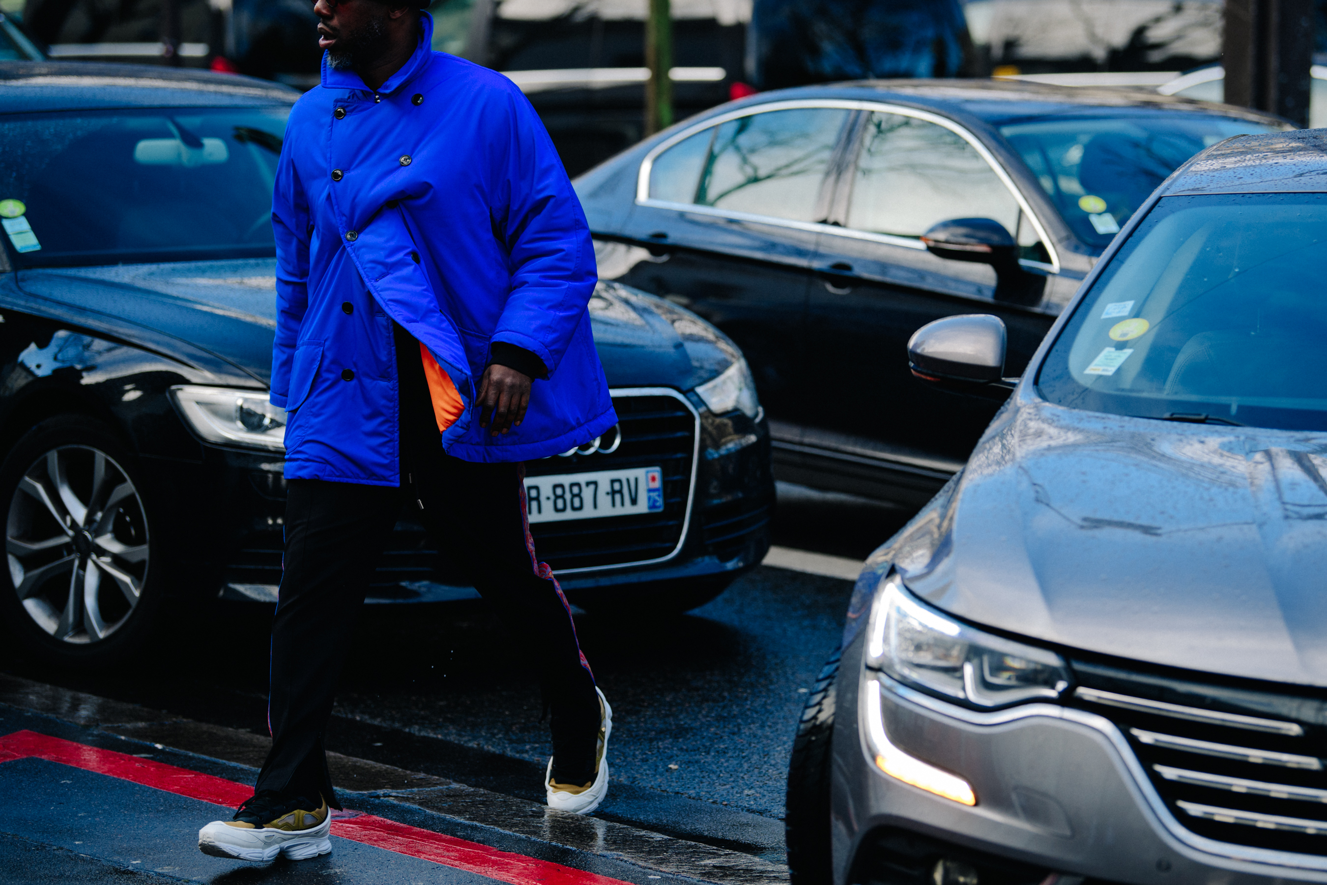 Man wearing bright blue jacket