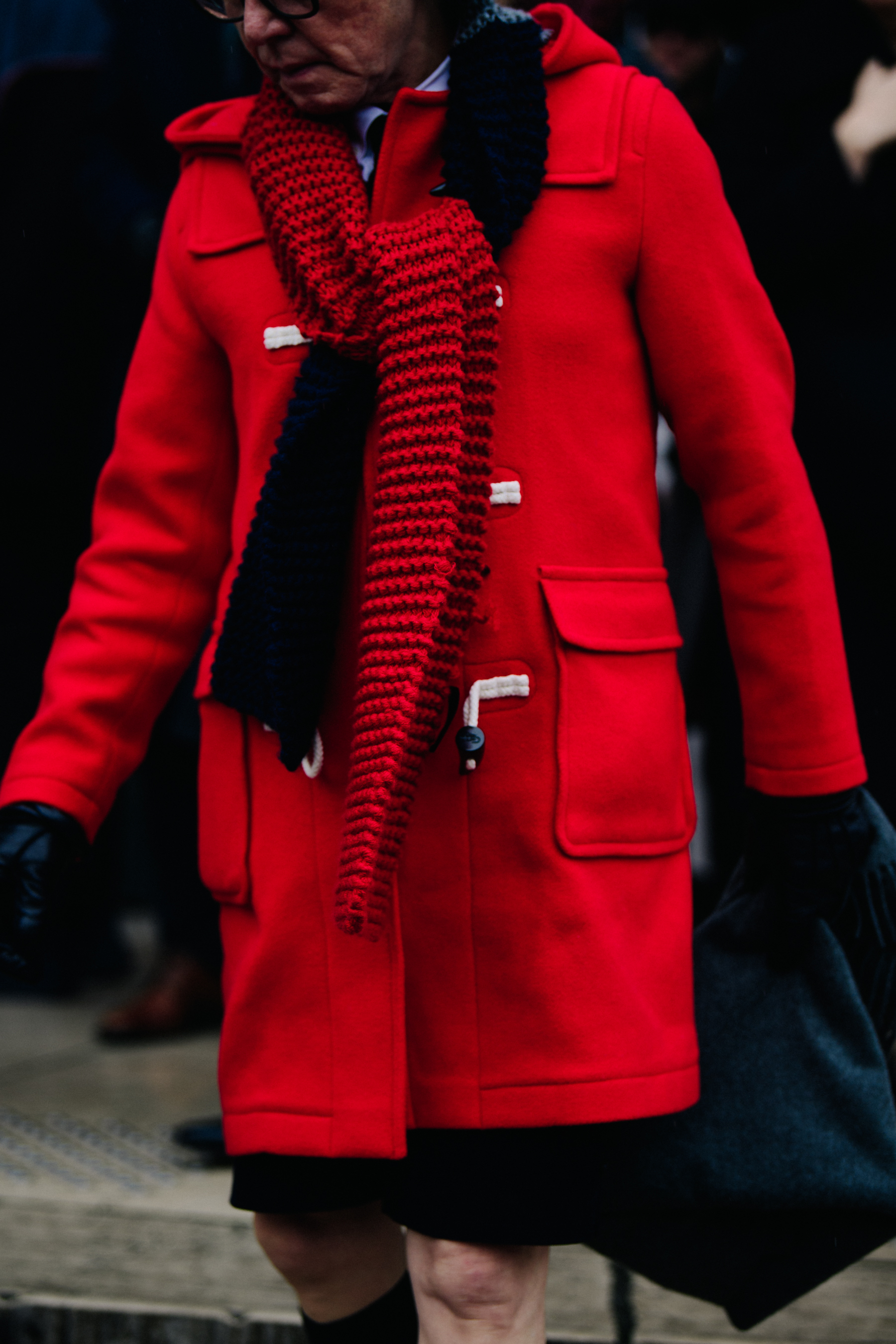 Japanese man wearing red scarf and coat