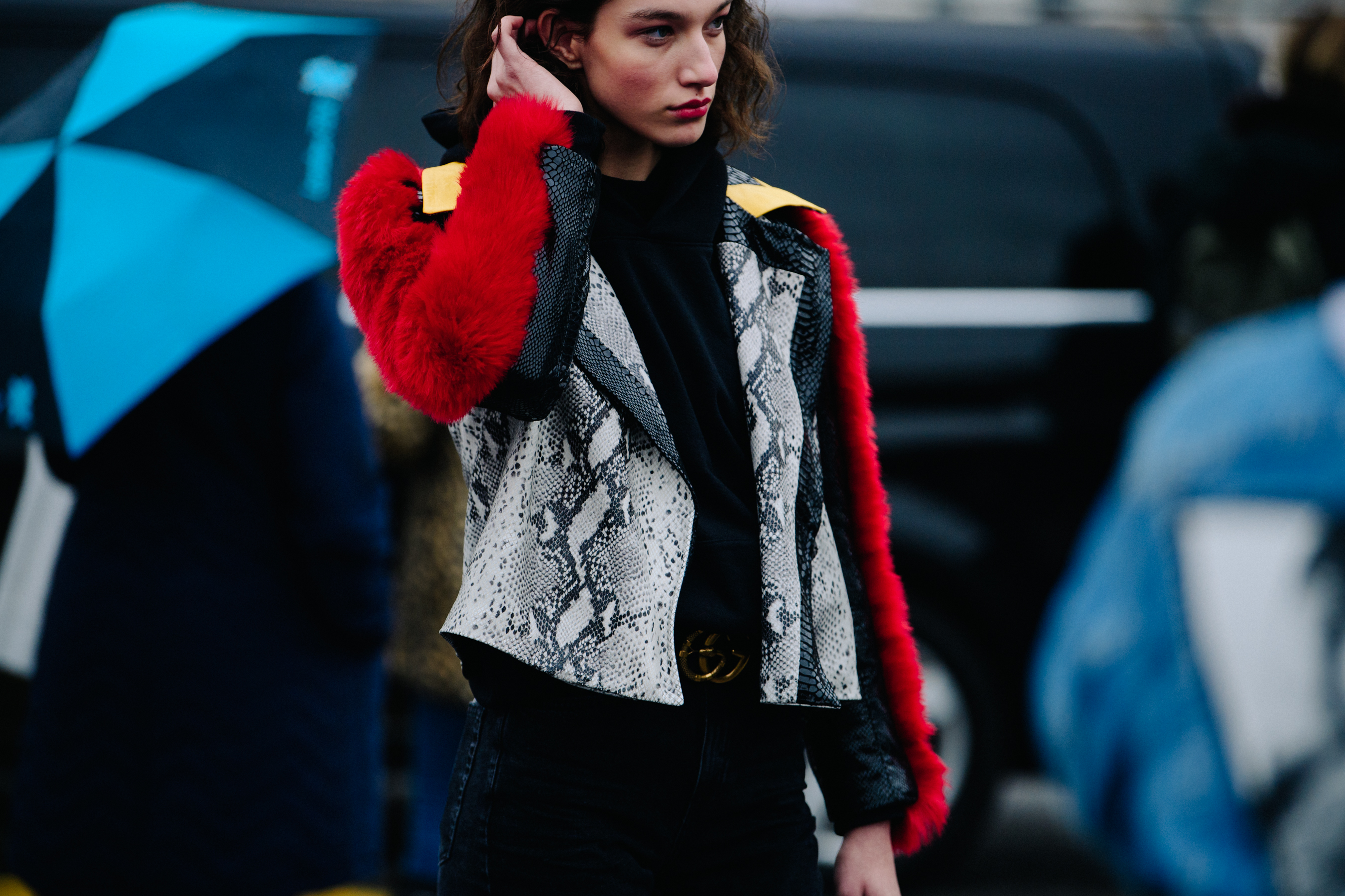 American model wearing Gucci belt